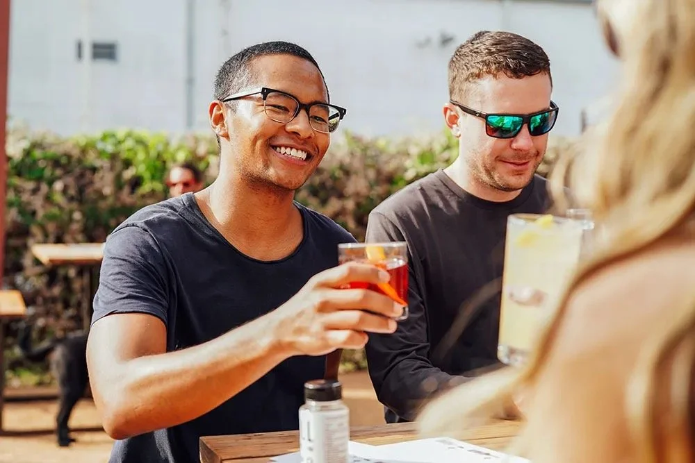 Still Austin Whiskey Co guests enjoying drinks.jpg