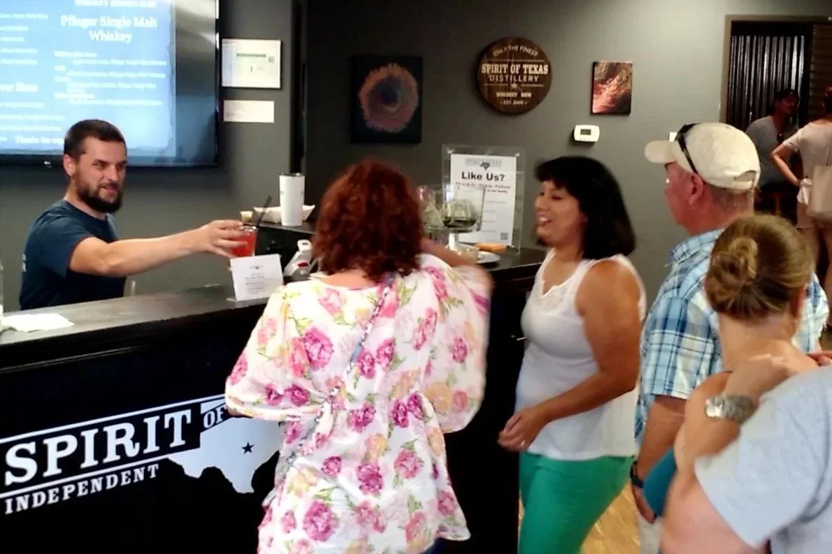 Spirit of Texas Distillery bar area guests.jpg