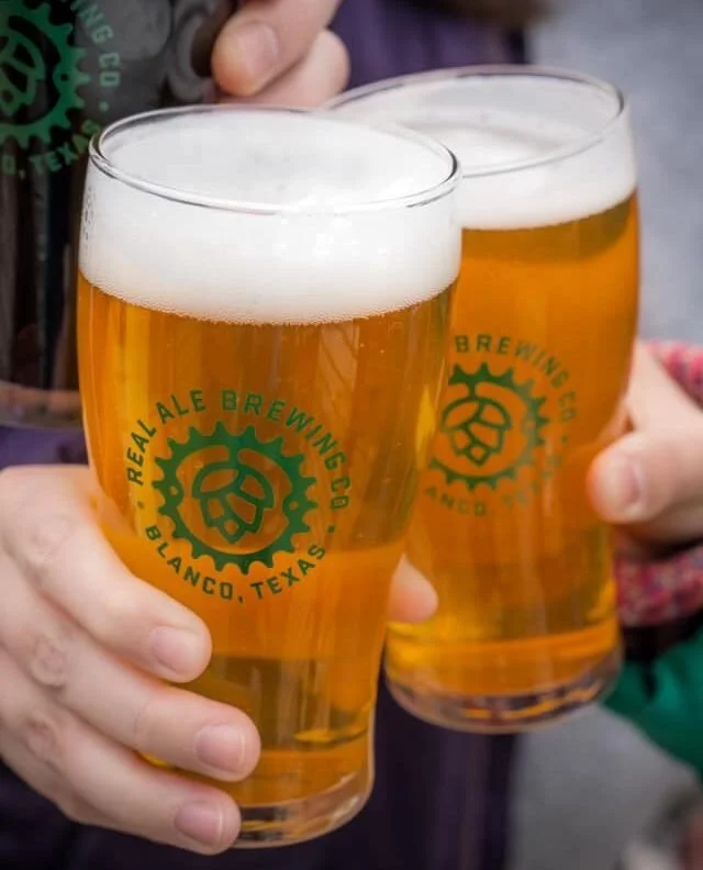 Real Spirits Distilling Co guests cheering pints.jpg