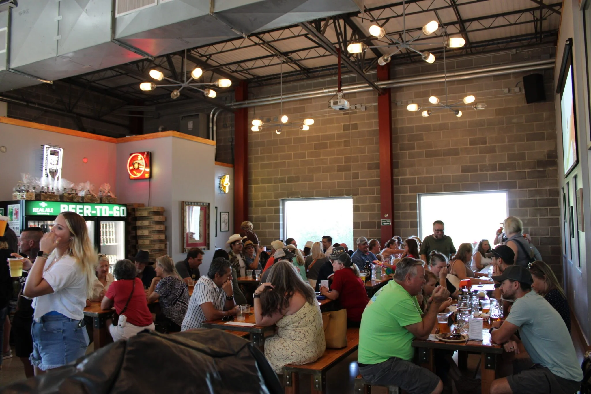 Real Spirits Distilling Co taproom interior guests.jpg