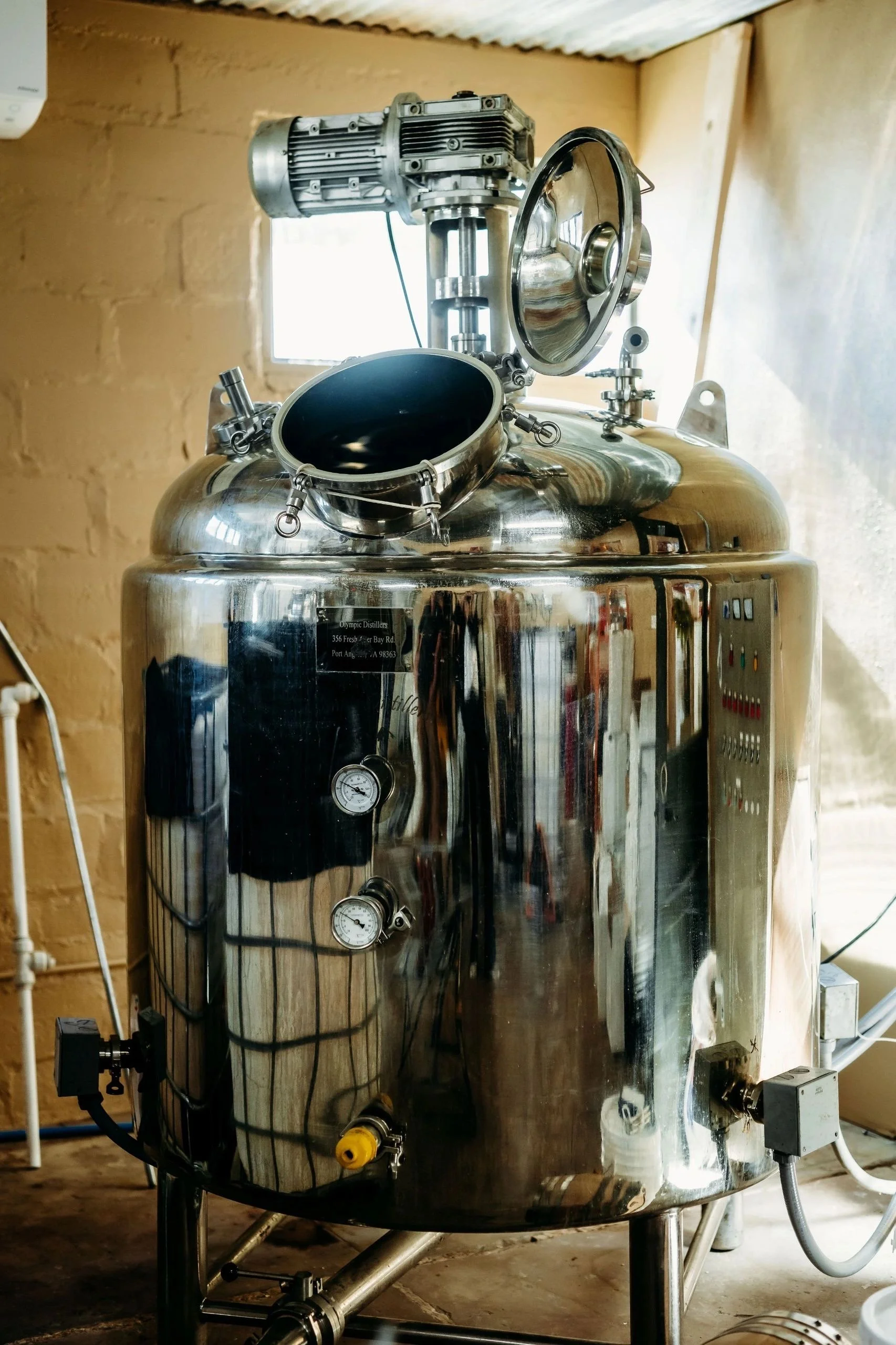 Porchlight Distillery barrel aging room.jpg