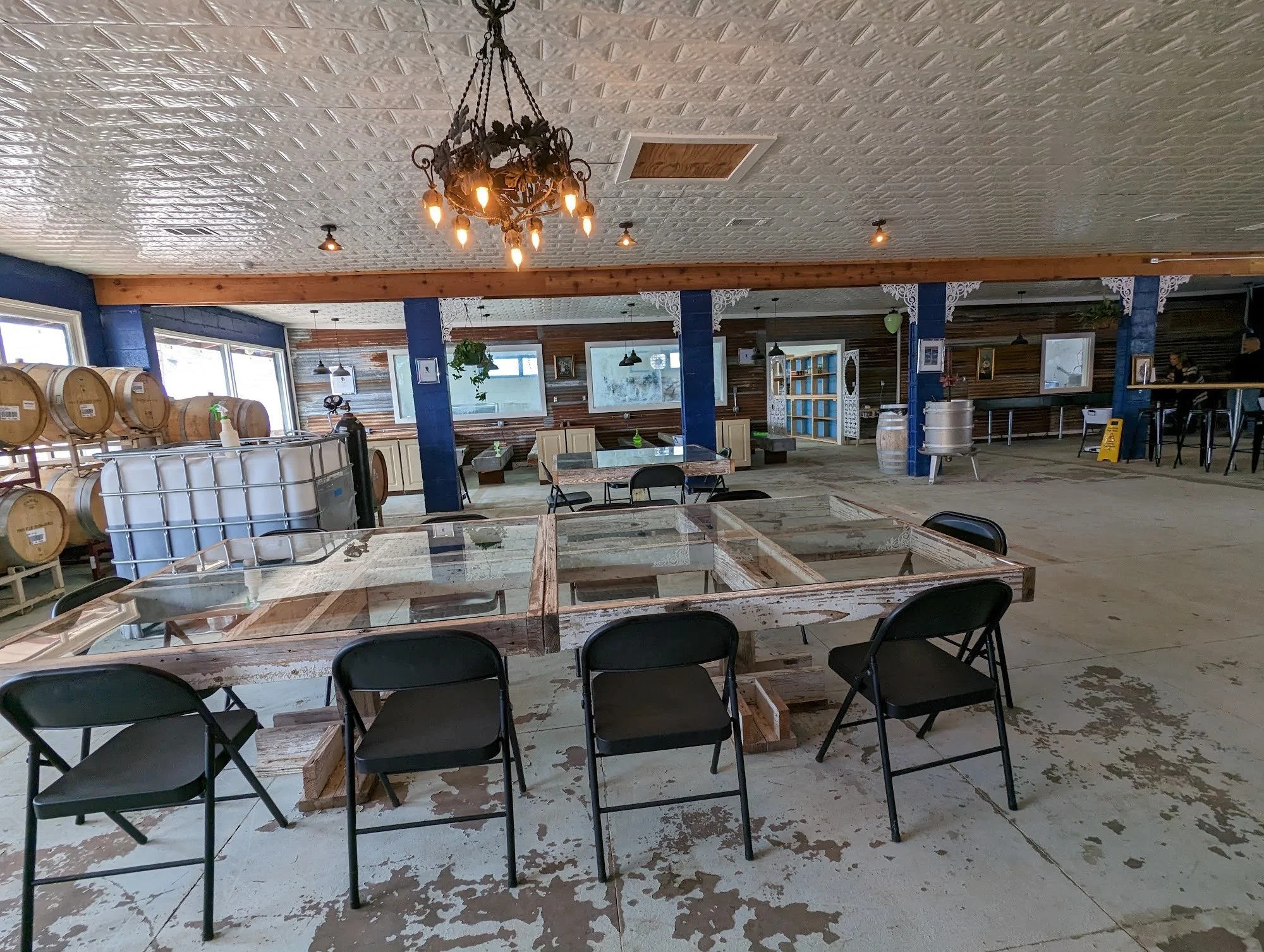 Porchlight Distillery rustic tasting room interior.jpg