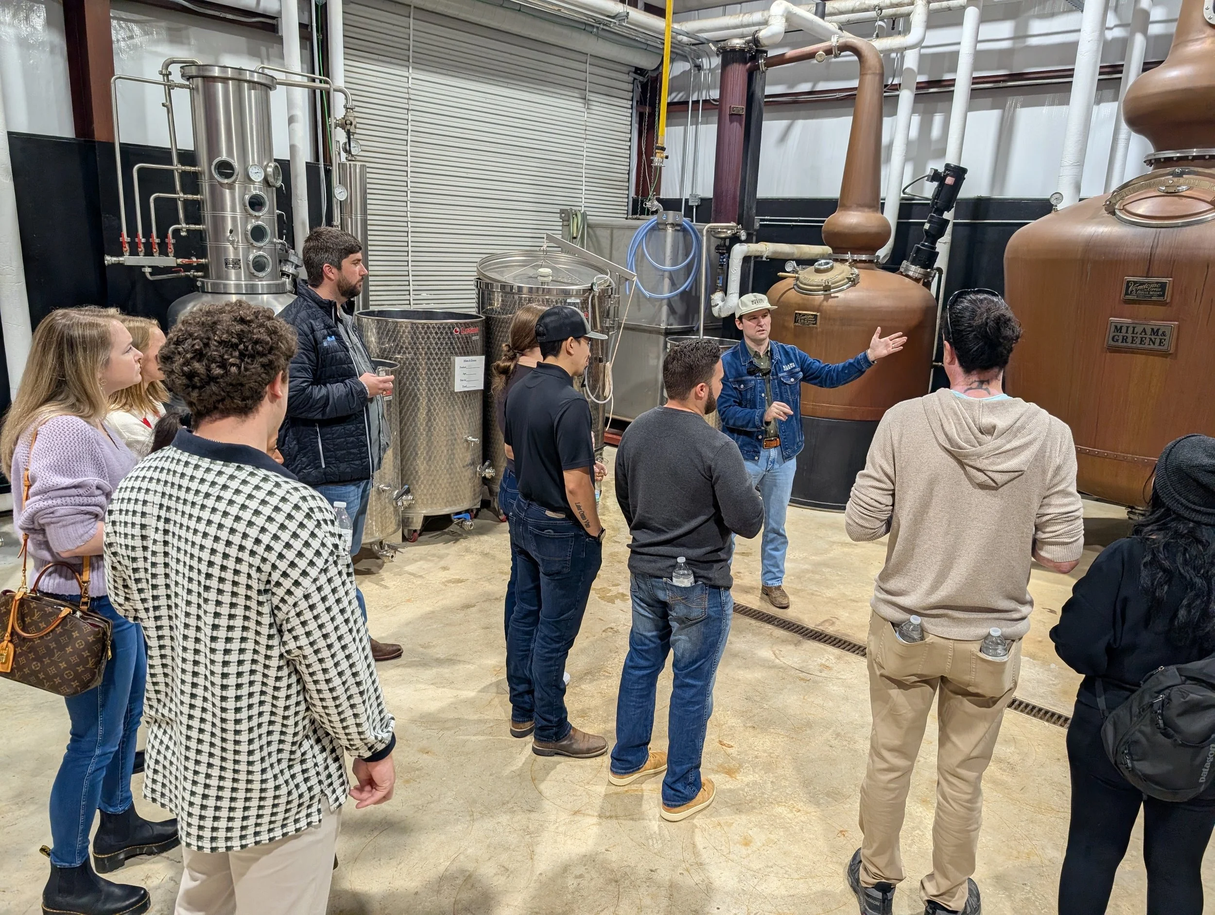 Milam and Greene distillery tour group.jpg