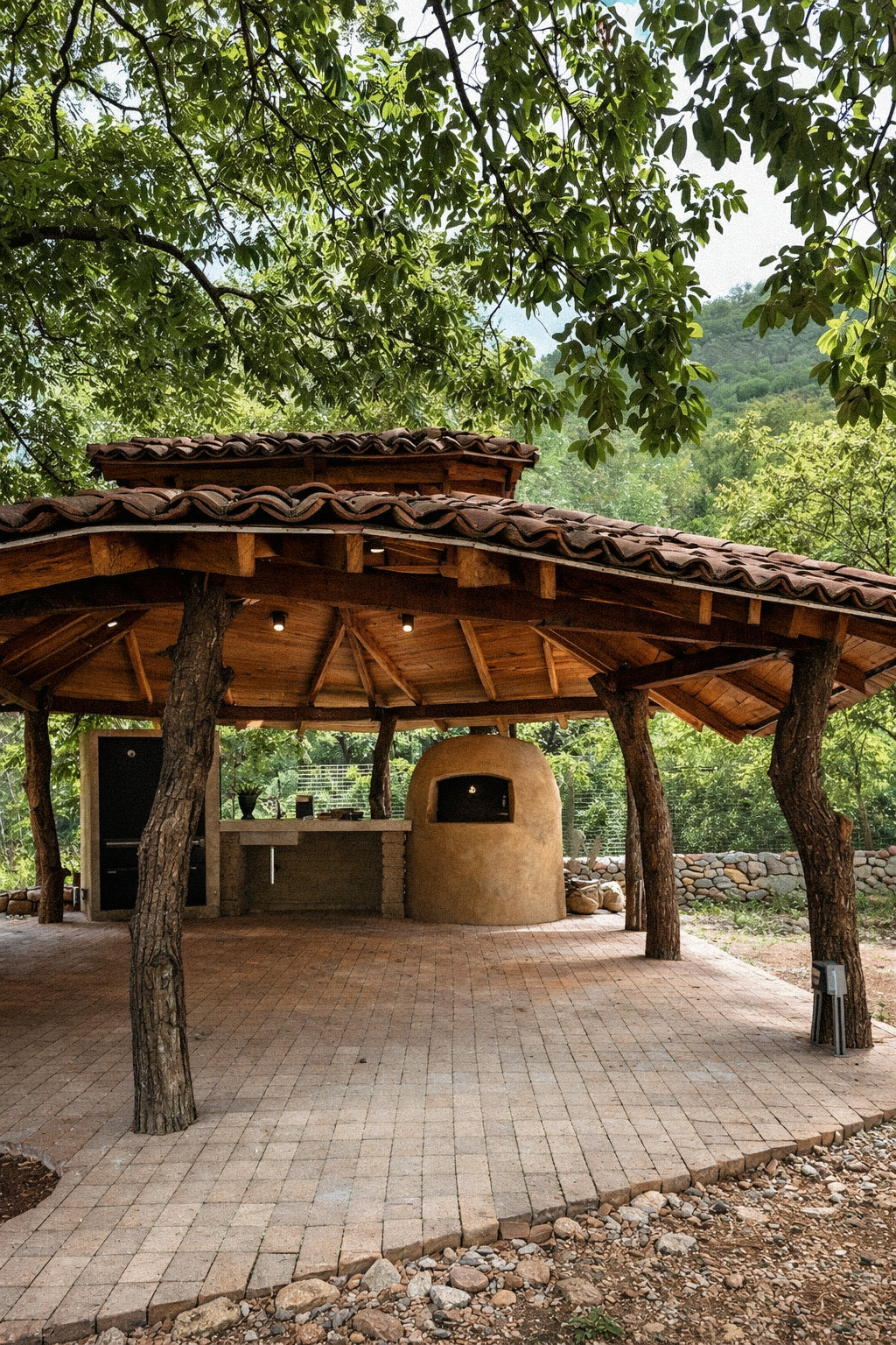 Clay tile palapa integrated into existing trees