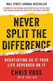 Book cover of 'Never Split the Difference' by Chris Voss with Tahl Raz, featuring yellow background and black and white text.