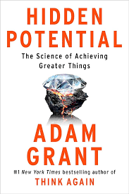 Book cover of "Hidden Potential" by Adam Grant, featuring a diamond partially embedded in a black rock.