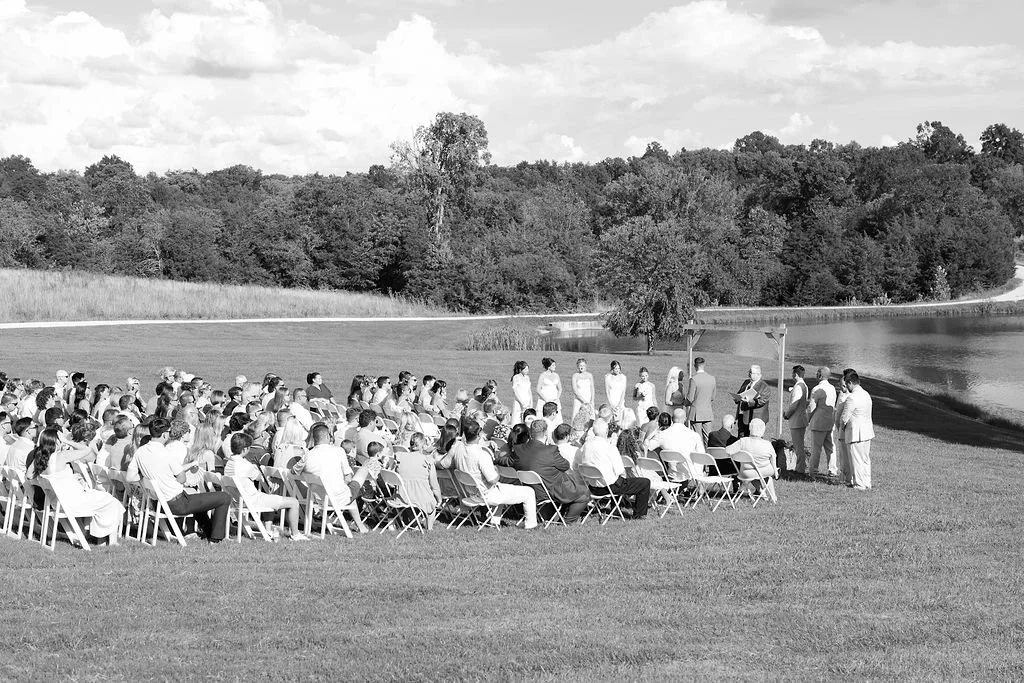 Outdoor wedding ceremony set against the Kentucky countryside