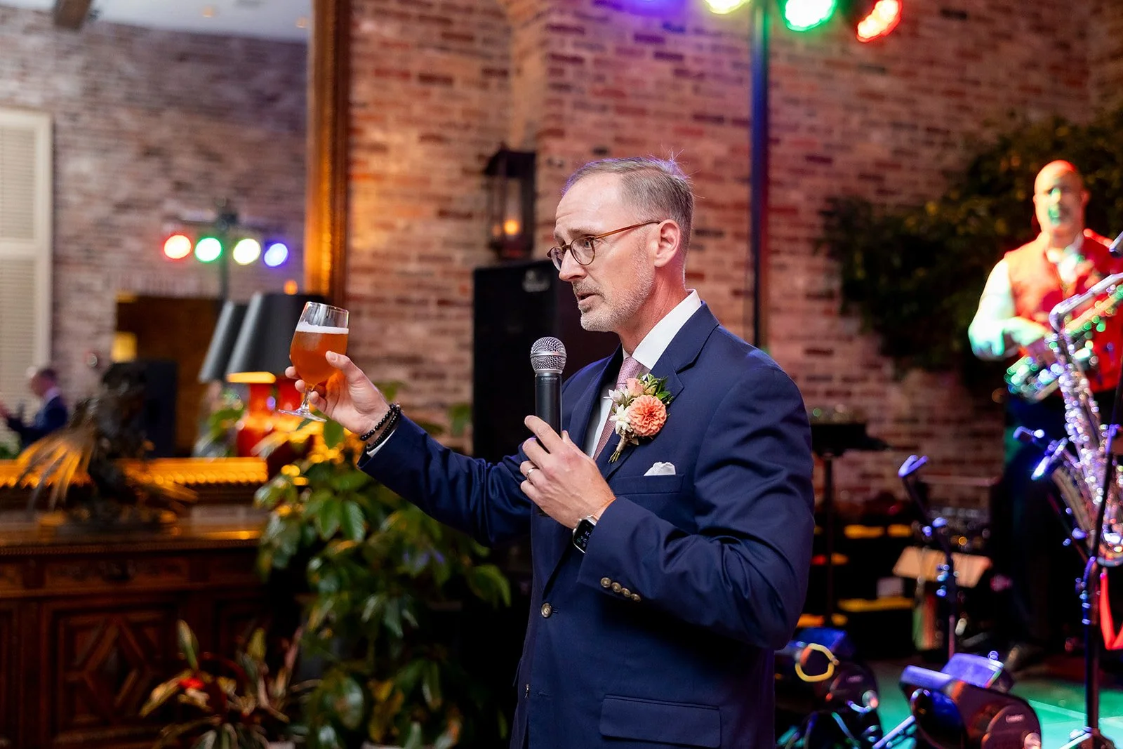 Groom giving a speech at The Apiary in Lexington