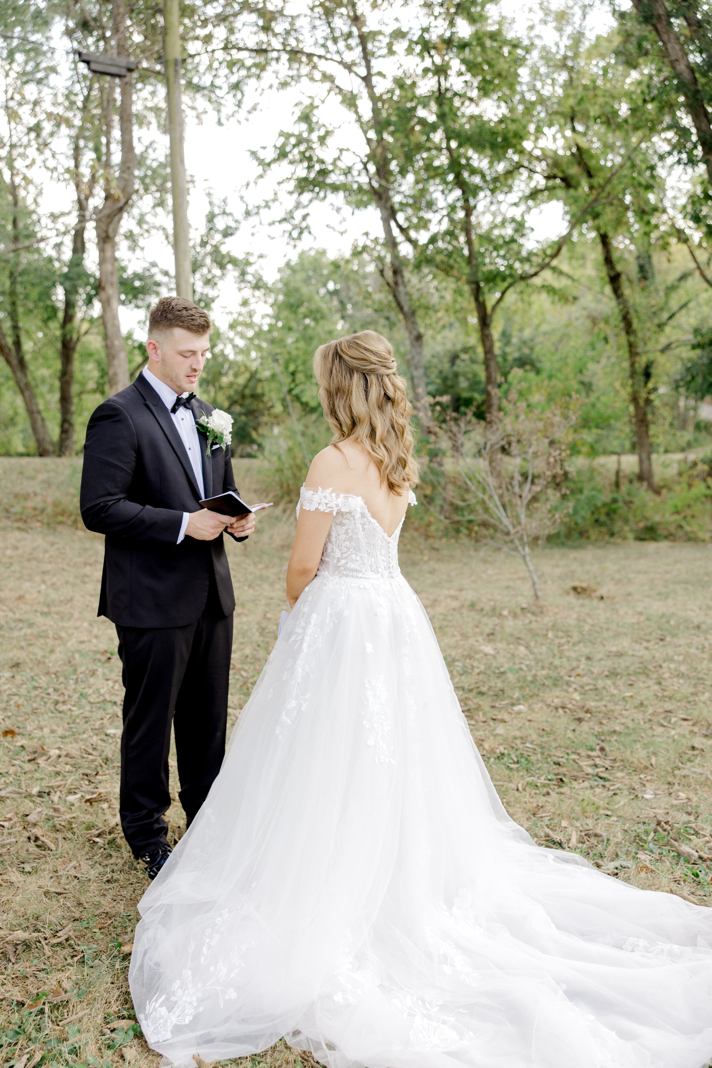 Bride and groom portrait first look during a Kentucky barn wedding outdoors