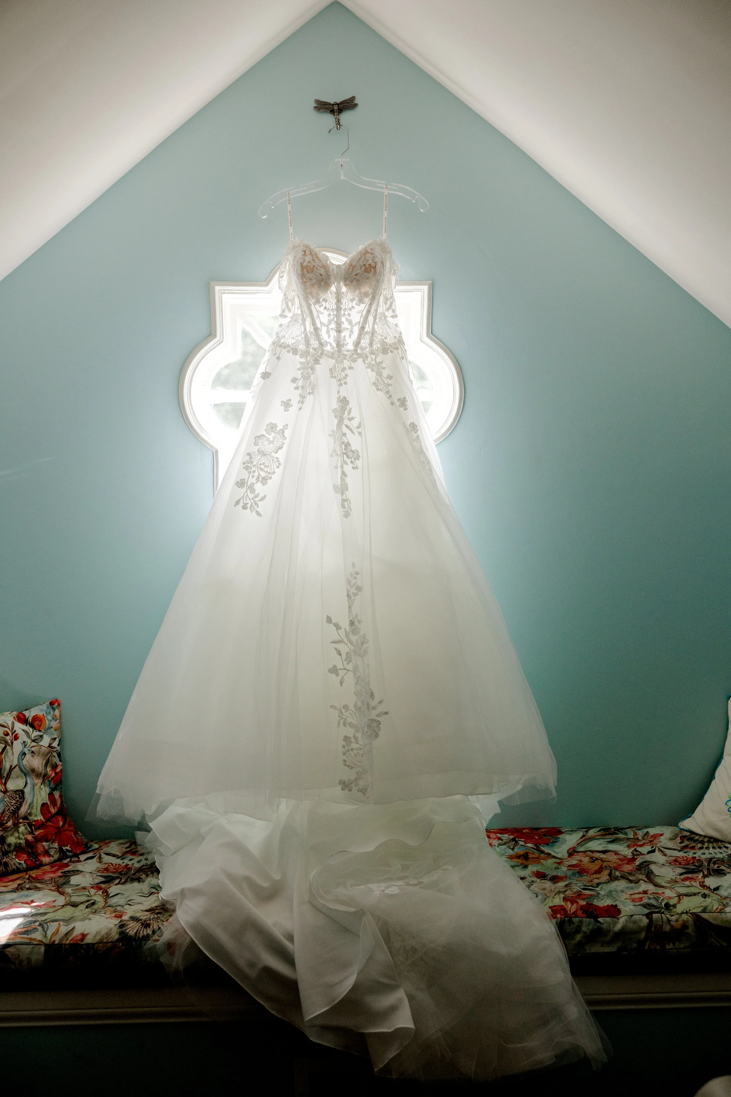 Bride’s wedding dress displayed before a Kentucky barn wedding