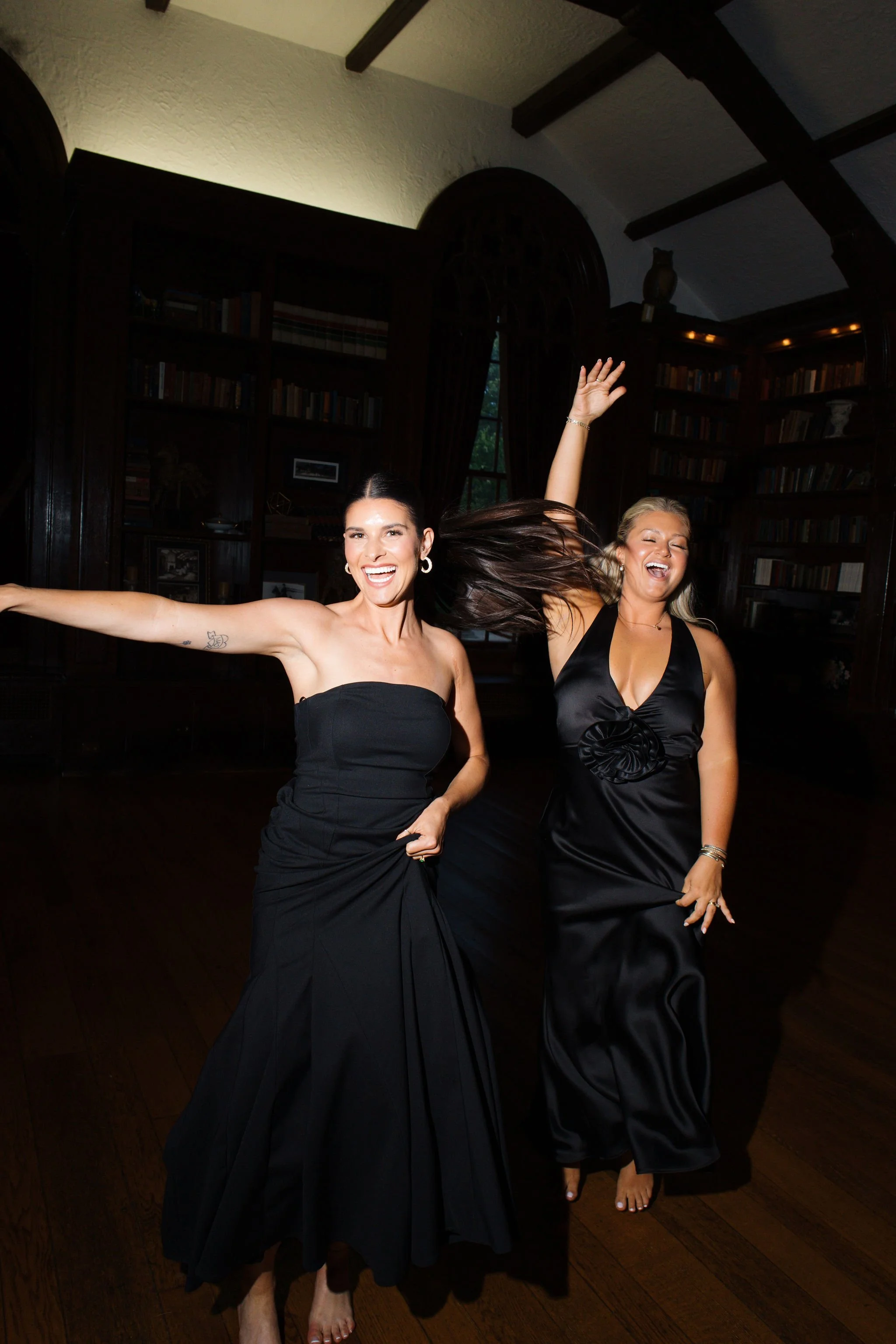 Wedding guests enjoying a live band at historic mansion
