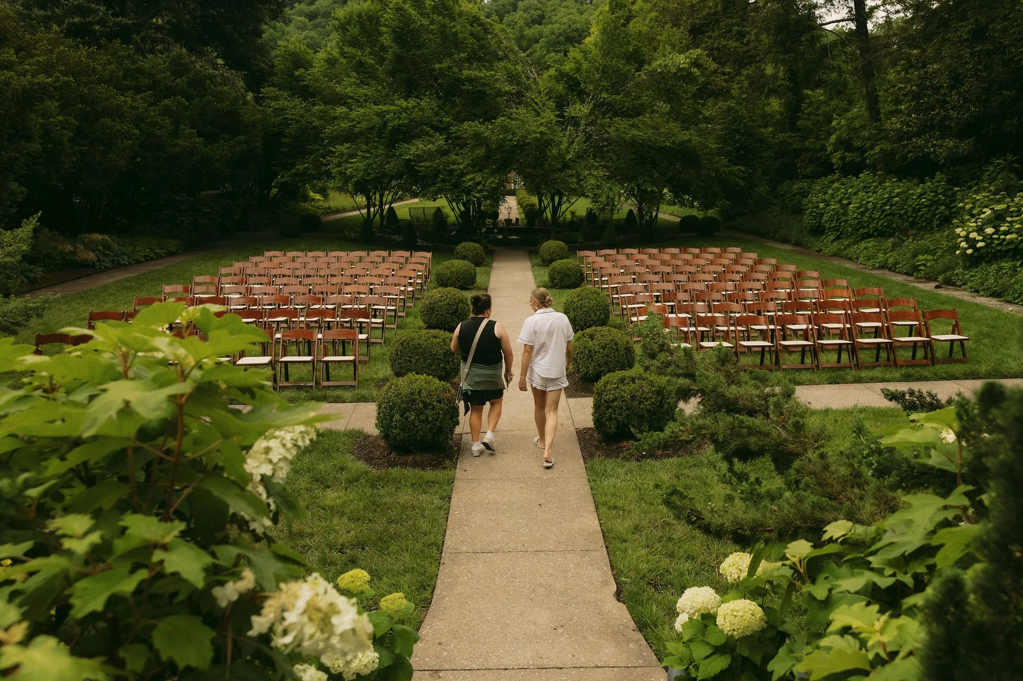Planner and bride walk through before wedding