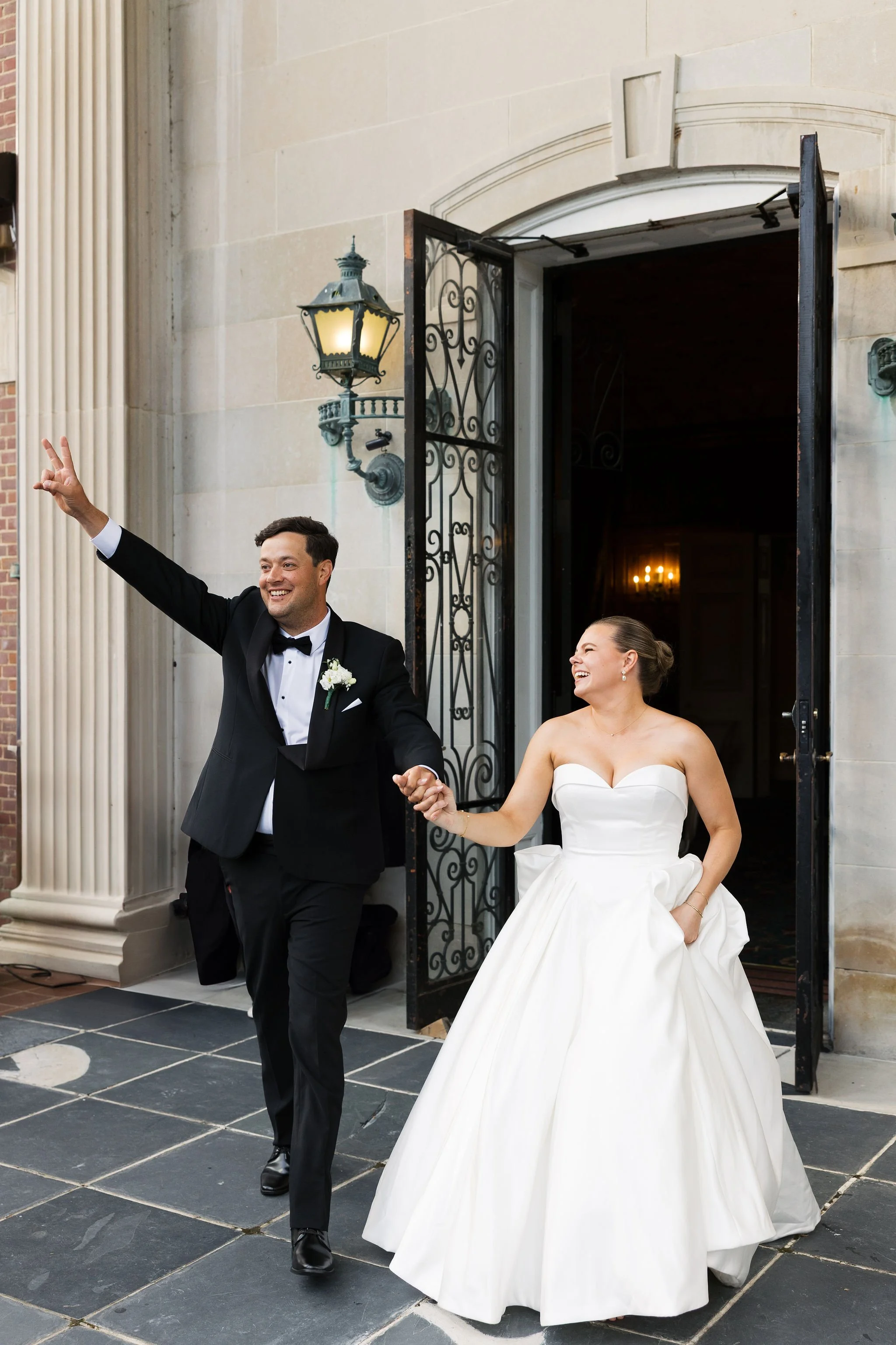 Bride and groom entering reception at Spindletop Hall