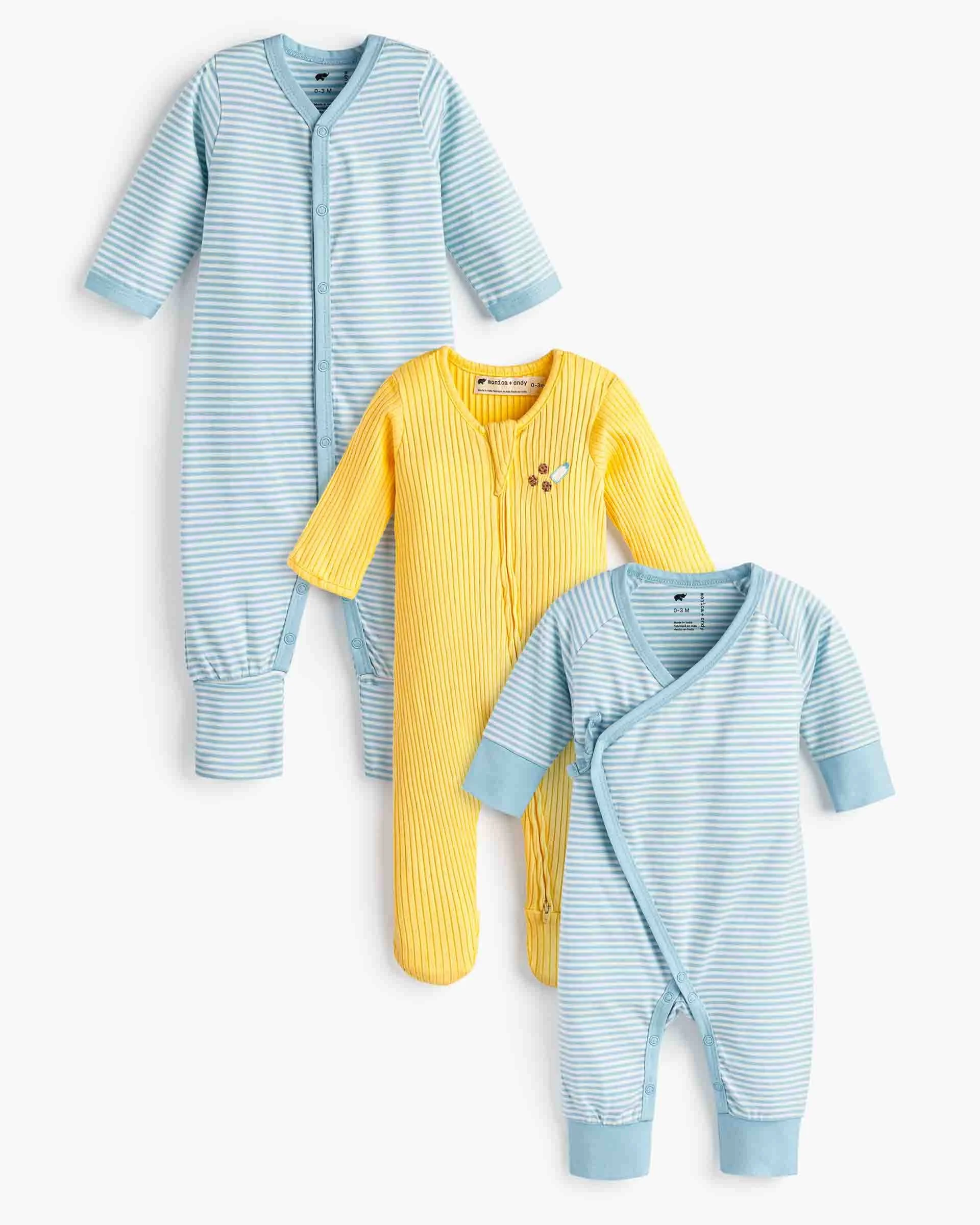 Three baby pajamas, two with blue and white stripes and one solid yellow with embroidery, displayed against a white background.