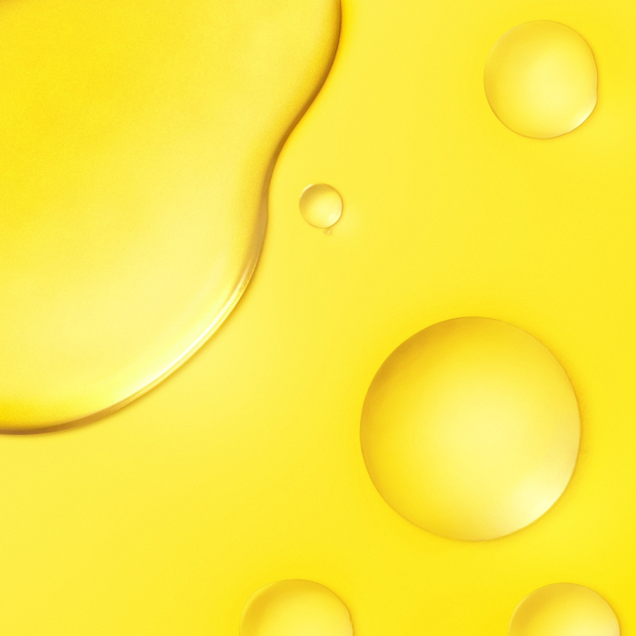 Yellow background with oil droplets