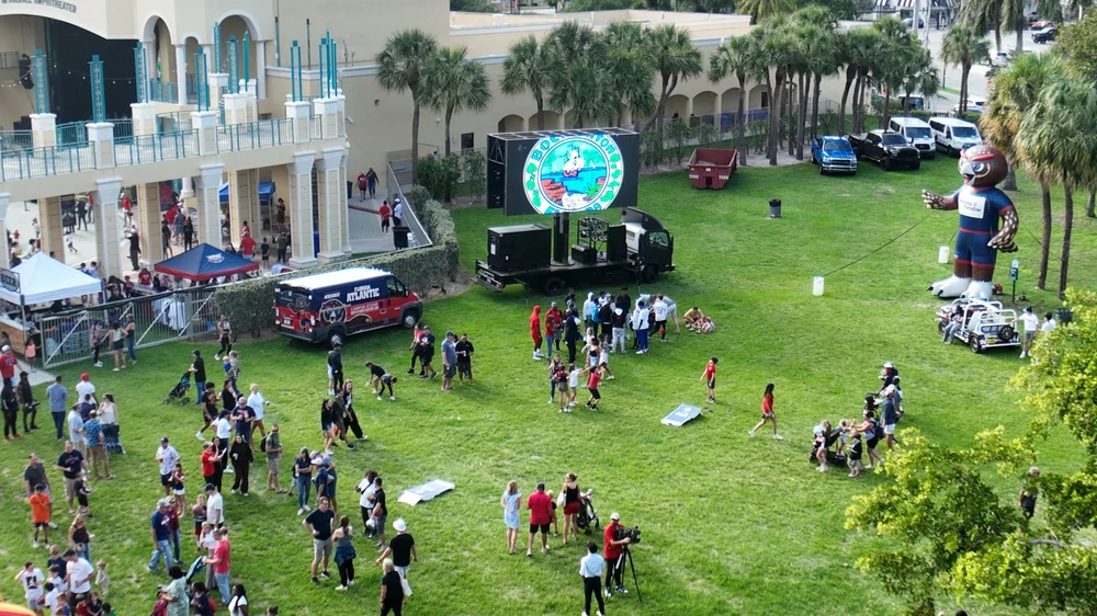 MAX 360 outdoor LED screen beside a Boca Raton live-streaming stage