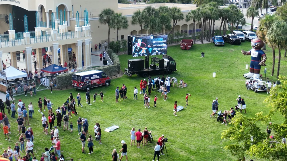 Double-sided MAX 360 LED display supporting a Boca Raton live event