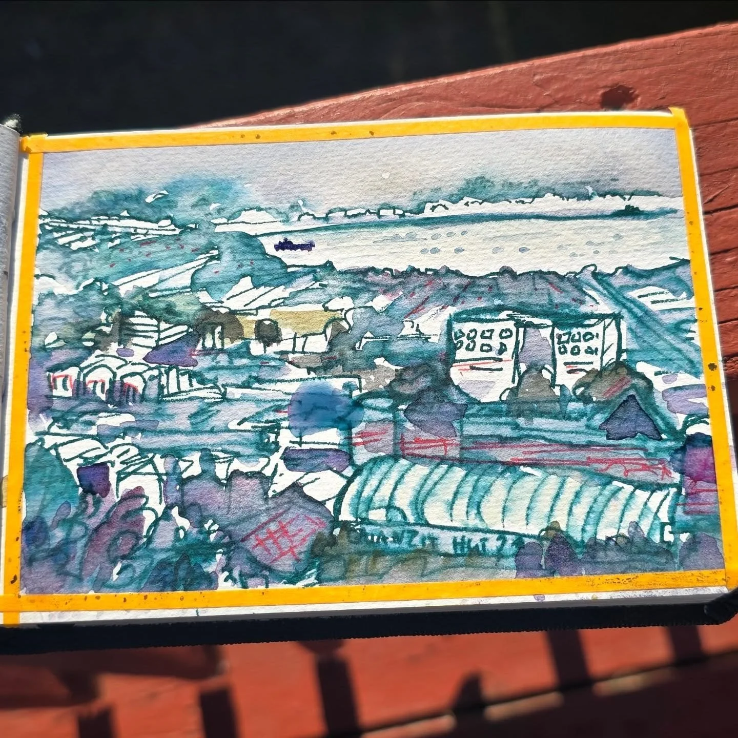 Enjoying the views of a city I haven't visited before. I had different color plans in mind for this peice, the. discovered my new marker was not waterproof. oops. #pleinairpril #sketchbook #watercolors