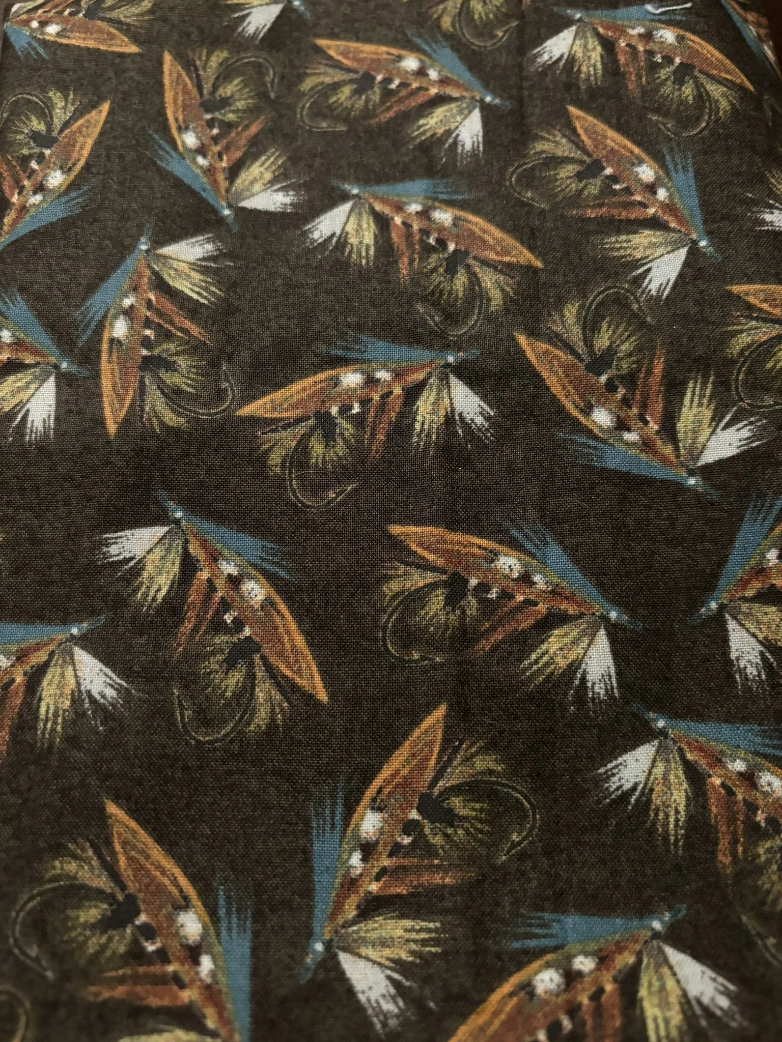 Fly Fishing Lures on Dark Gray Cotton