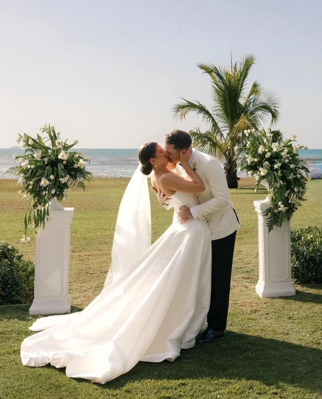 Maddy and Haydon, married at Yangaro Resort in tropical Queensland.

Their day had all the feeling of a destination wedding, right here in Australia. Set within a modern architectural private estate, surrounded by coconut palms, a secluded beach and 