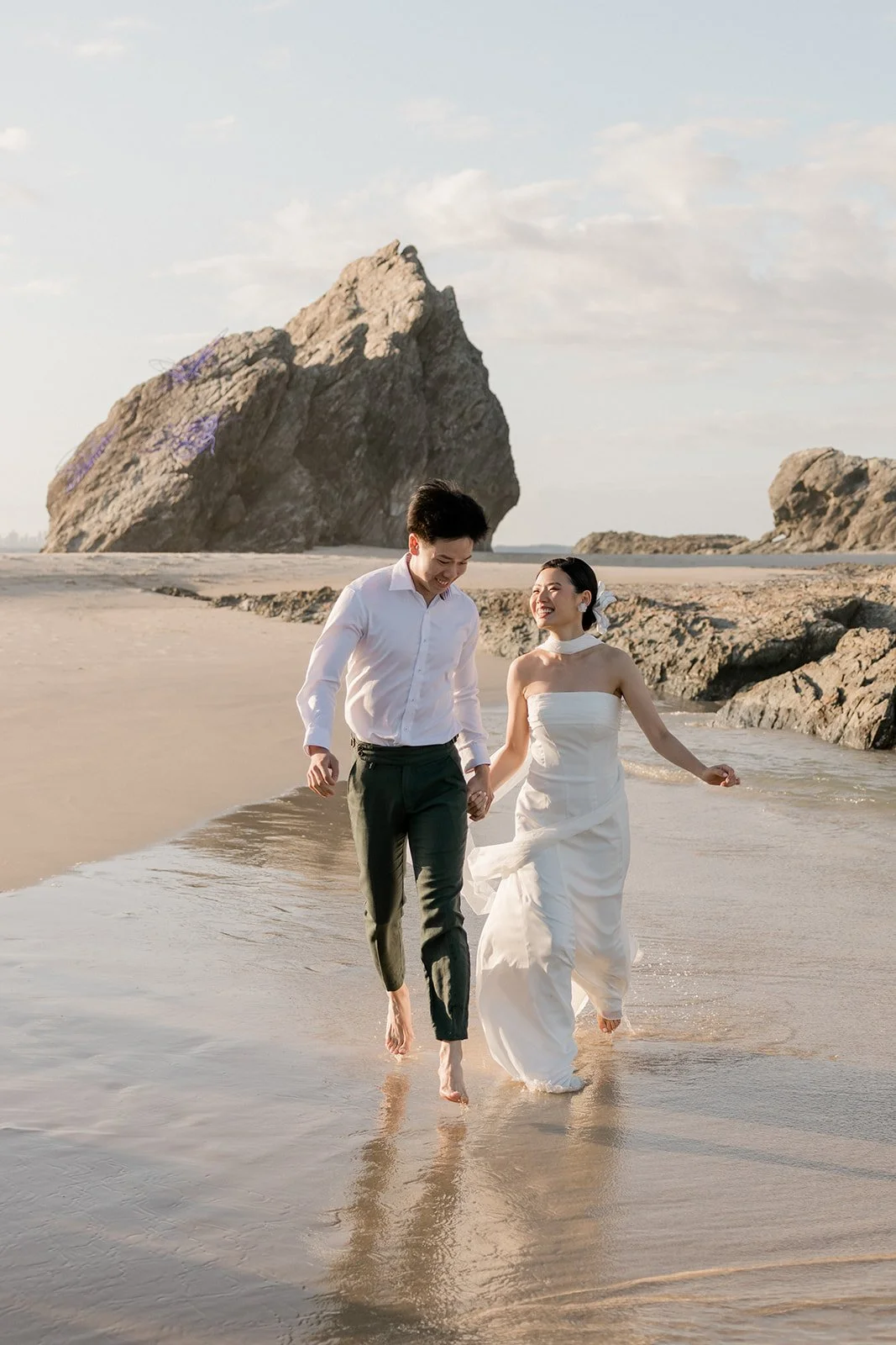 Couple running on the Gold Coast for their Engagement