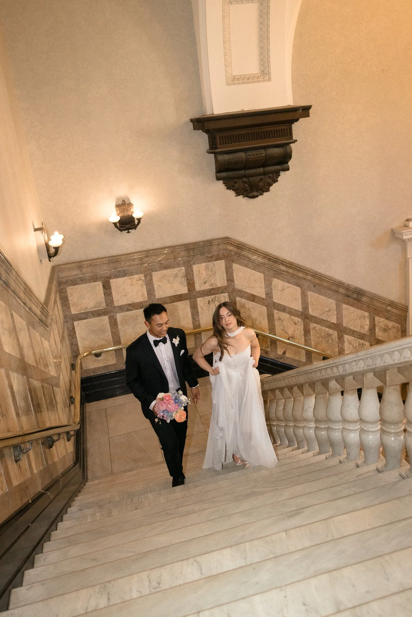 Bride and Groom Walking up City Hall after their Brisbane Elopement at the Registry