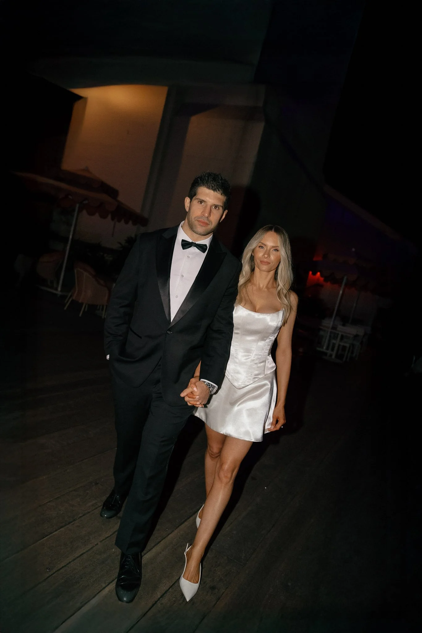 Bride and groom walking to their Brisbane wedding reception.jpg