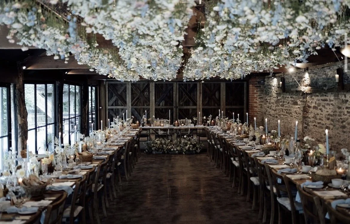 Wainhouse U shape with hanging blue flowers.jpg