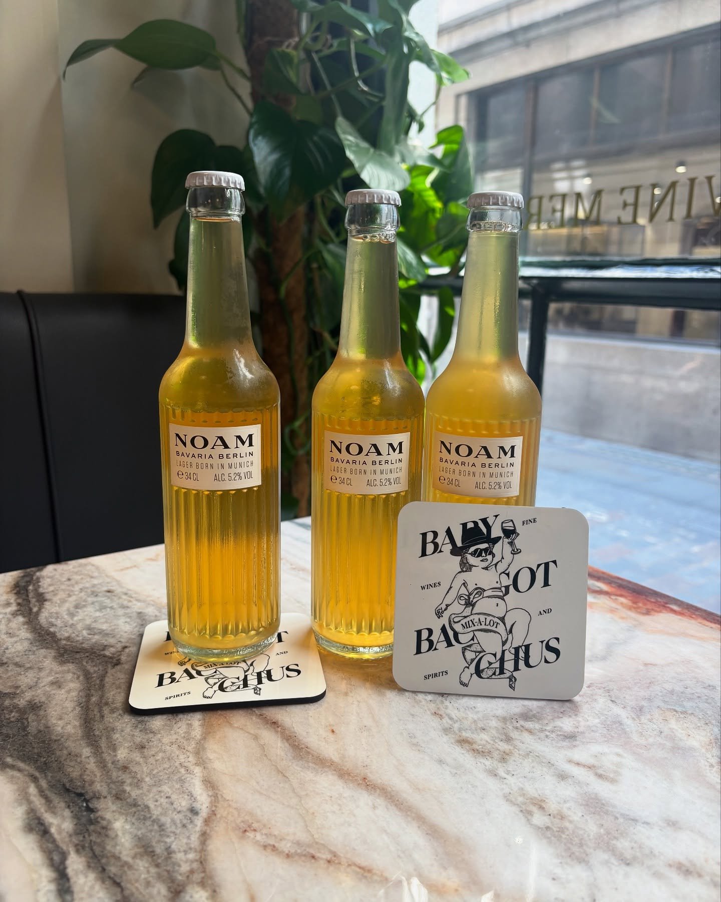 Did you know we also serve bottled beer here at Baby Bacchus? 
Noam is an unfiltered lager presented in a beautiful ridged bottle. Super refreshing with subtle aromatic, hoppy flavour. A modern homage to classic Bavarian beer. We recommend having a b