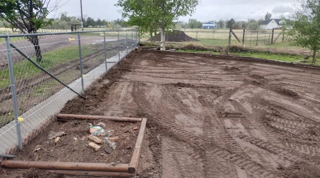 Dirt tom side view tracks before sod.jpg