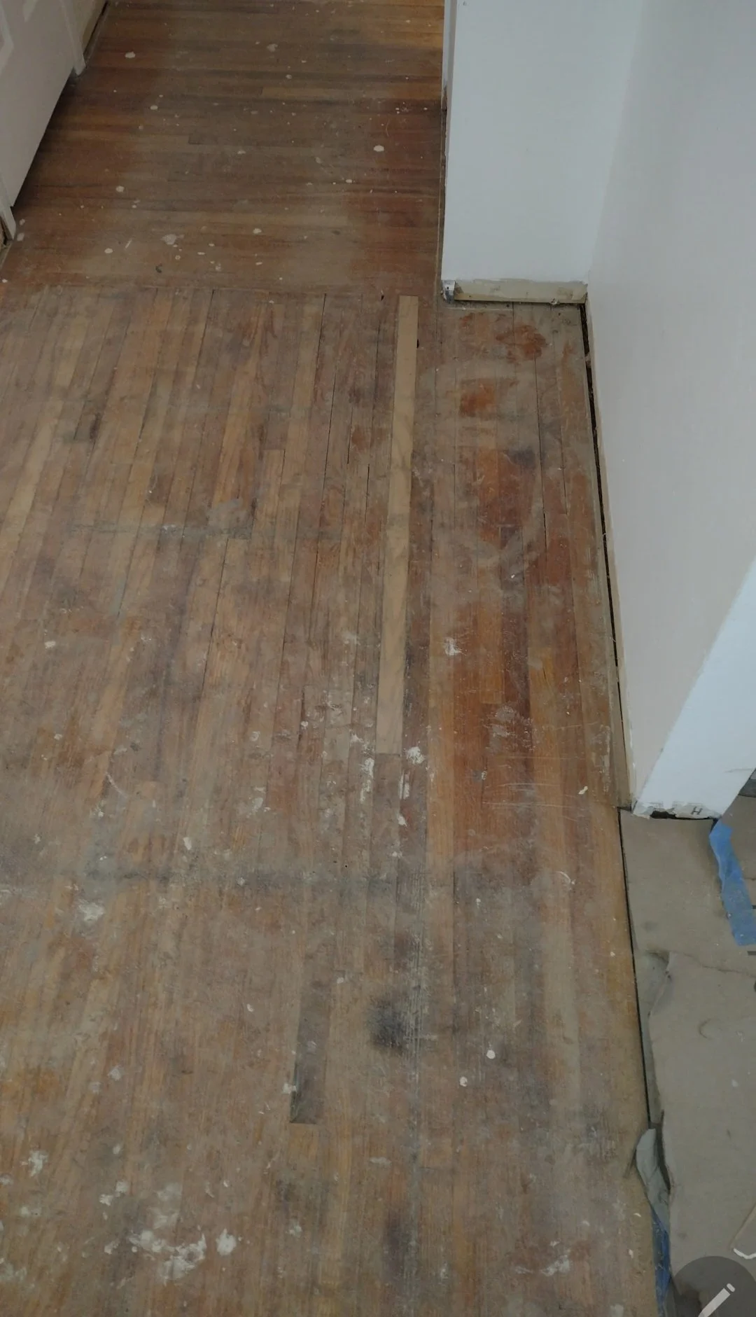 Unfinished floors near hallway no base OH .jpg