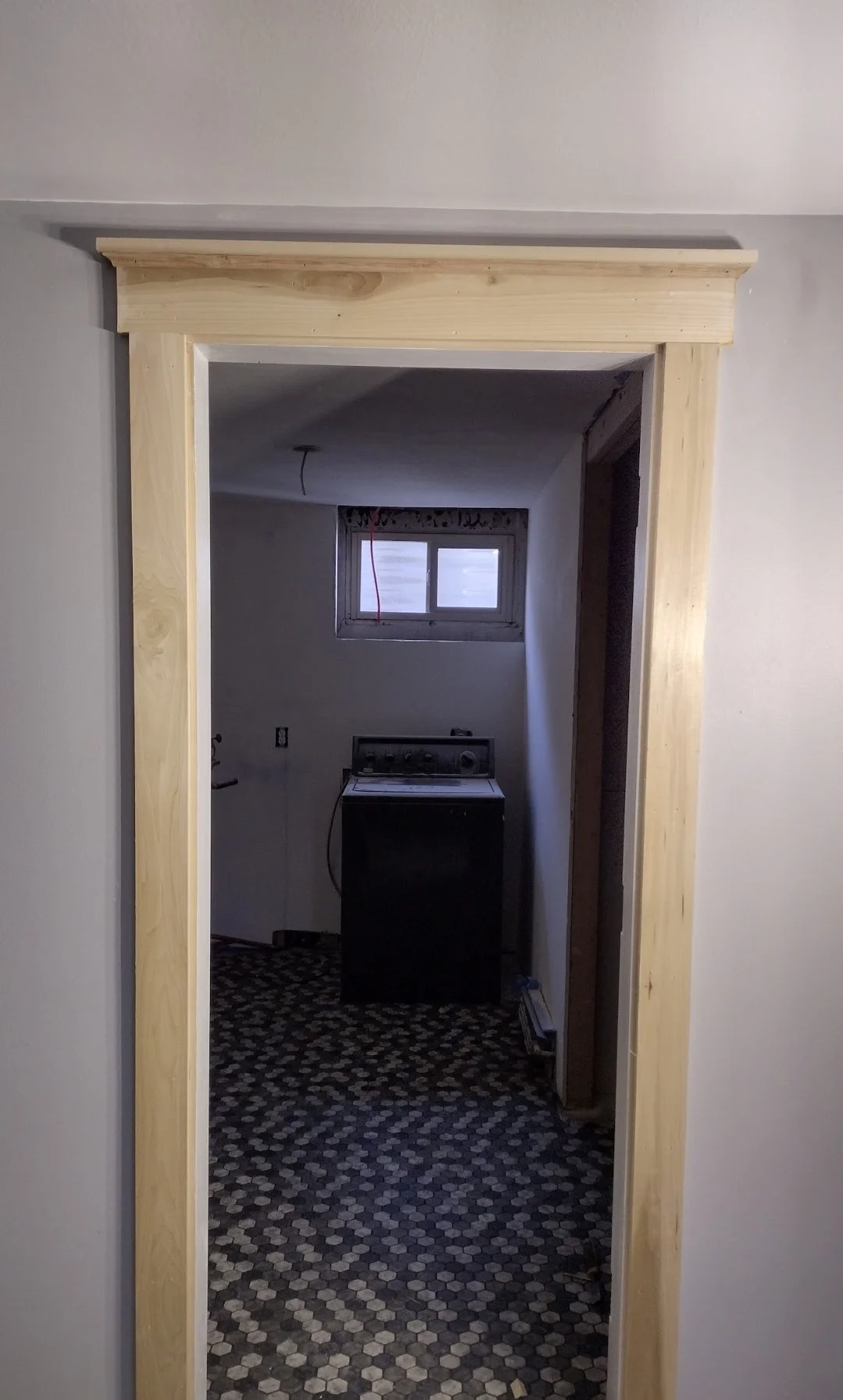 trim doorway with new tile oh ll.jpg