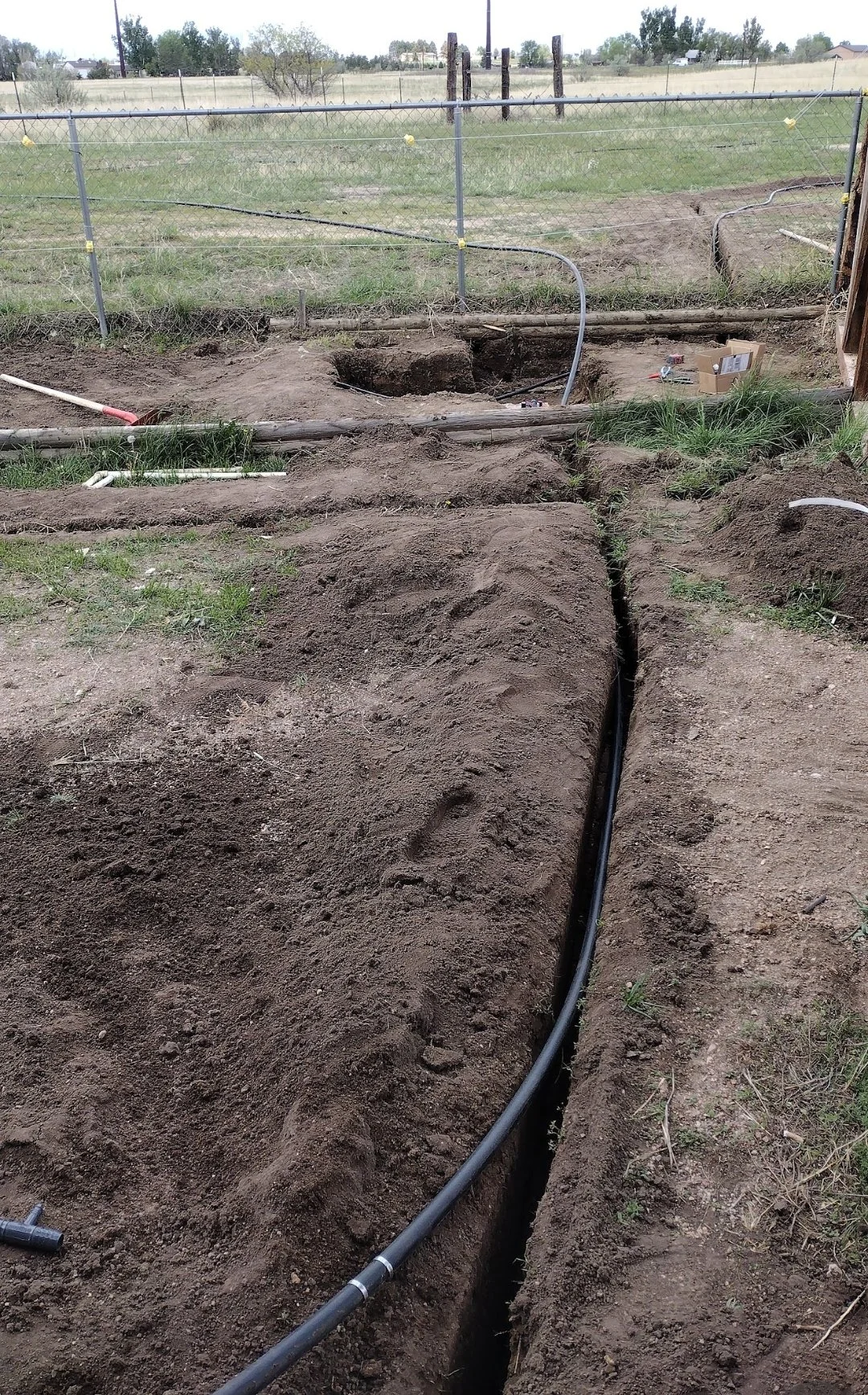 sprinkler line install Tom another line shot.jpg