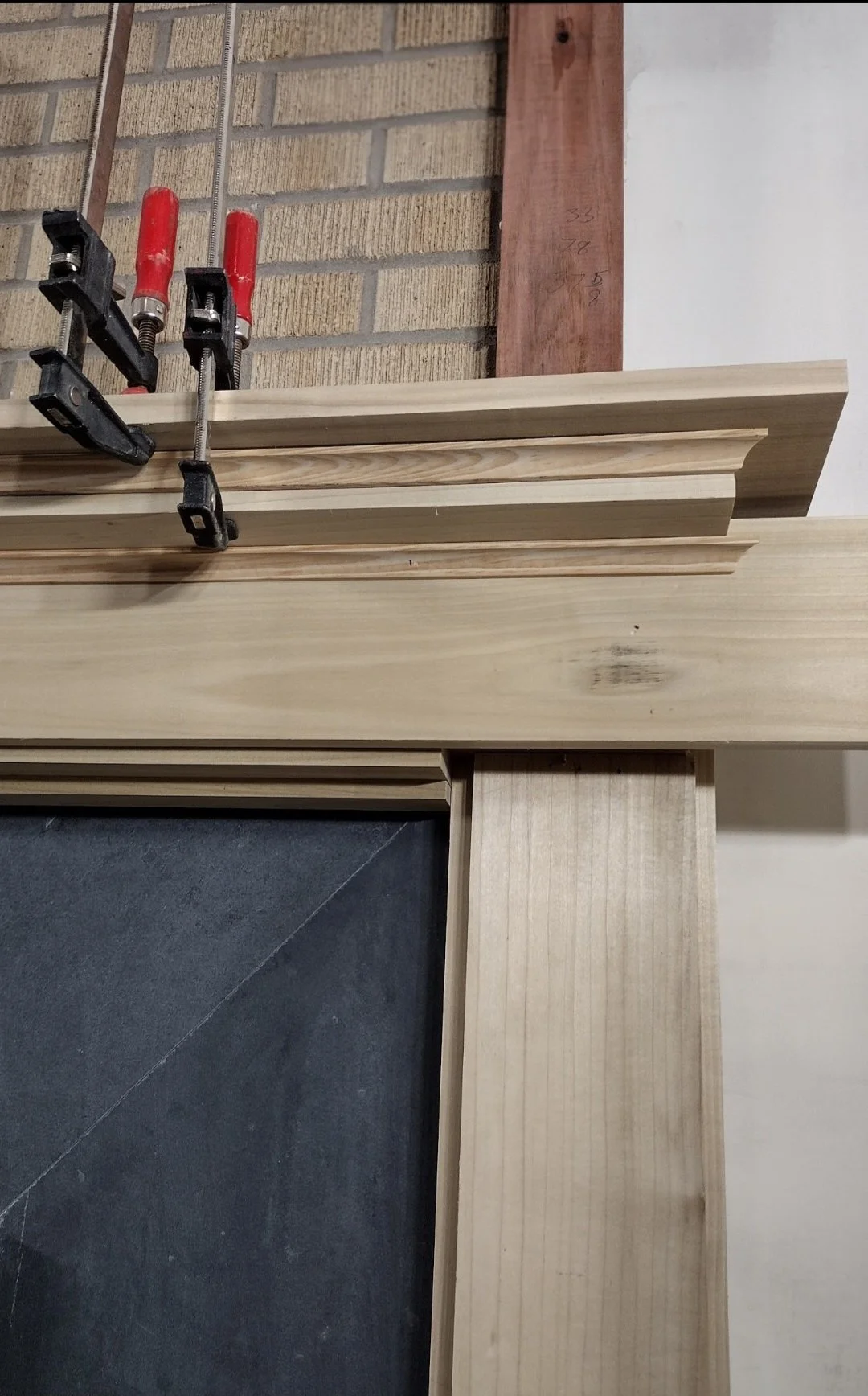 base trim fireplace oH ll and clamp.jpg