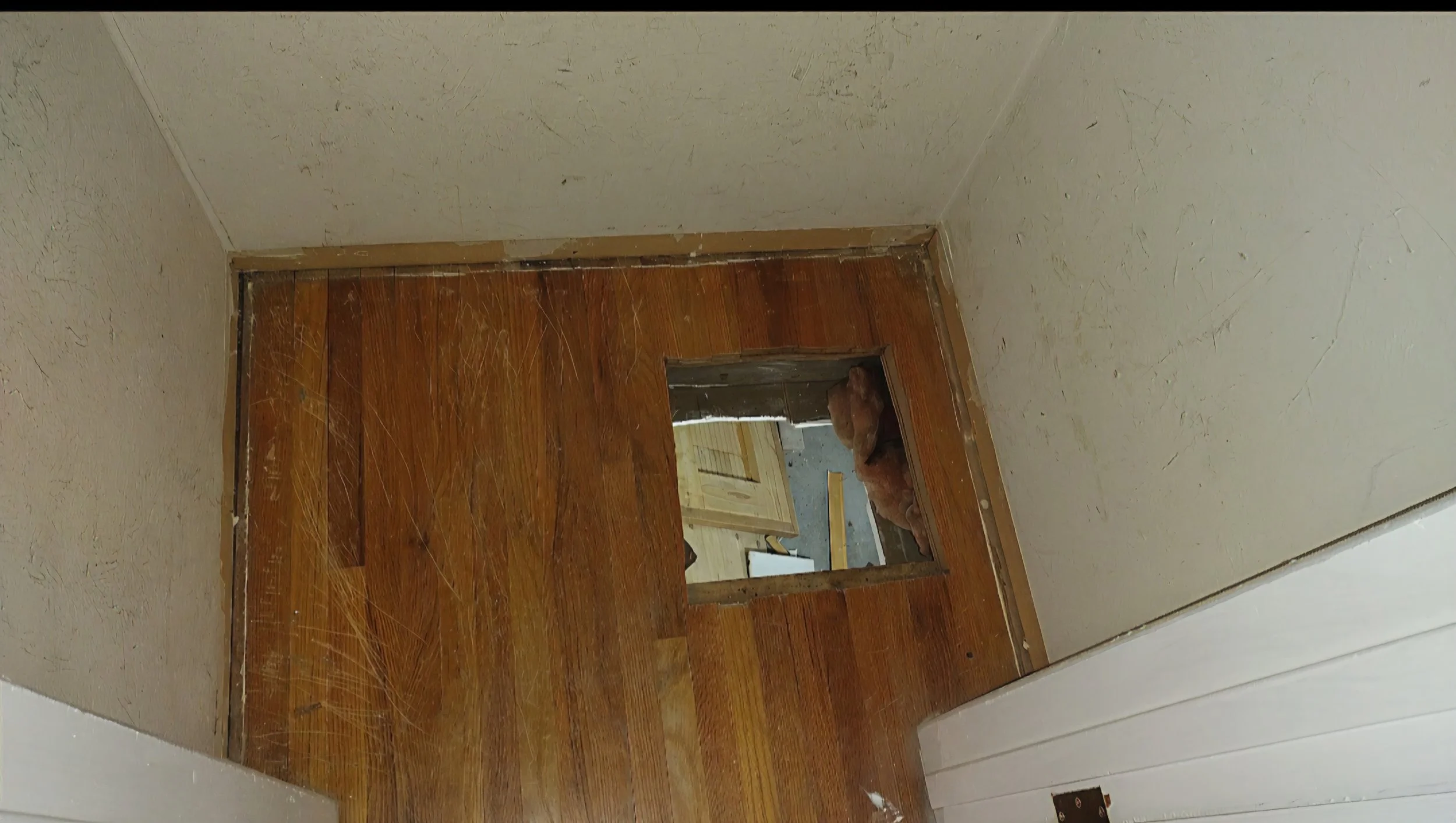hole in closet before and nasty old house.jpg