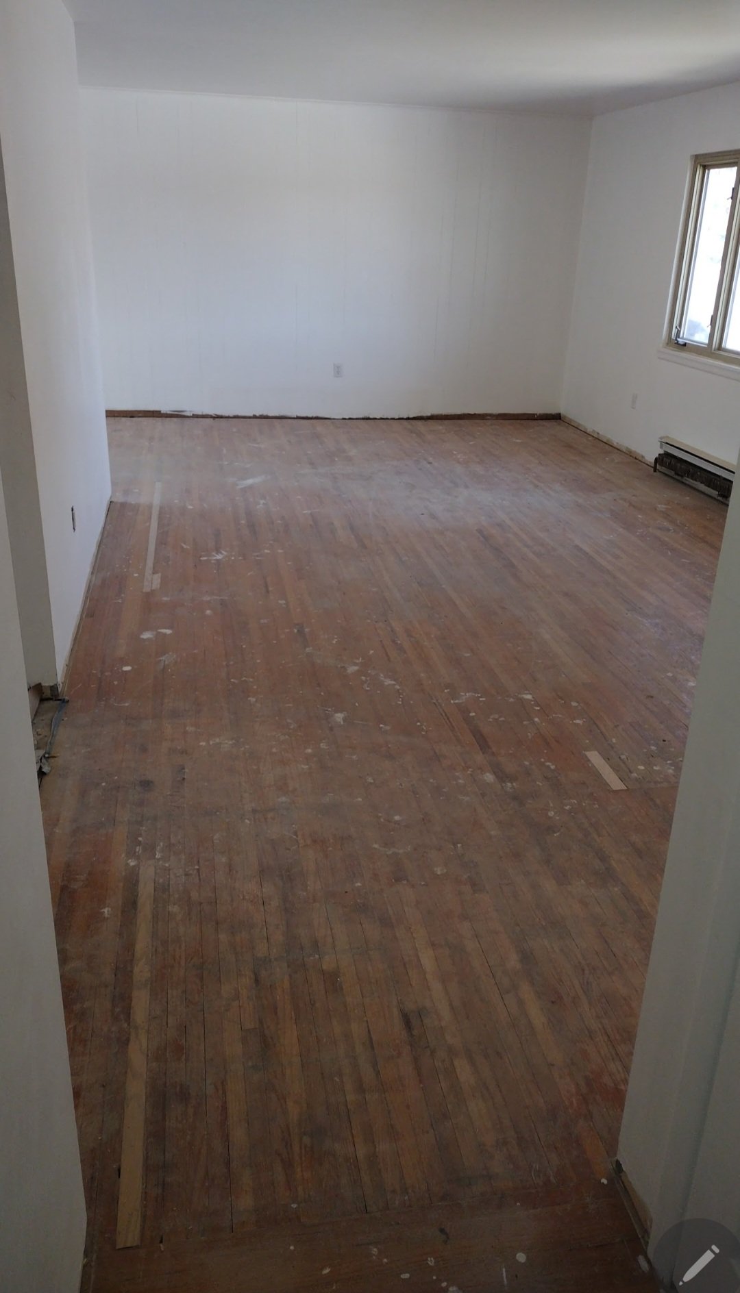 No trim unfinished UL living room OH.jpg