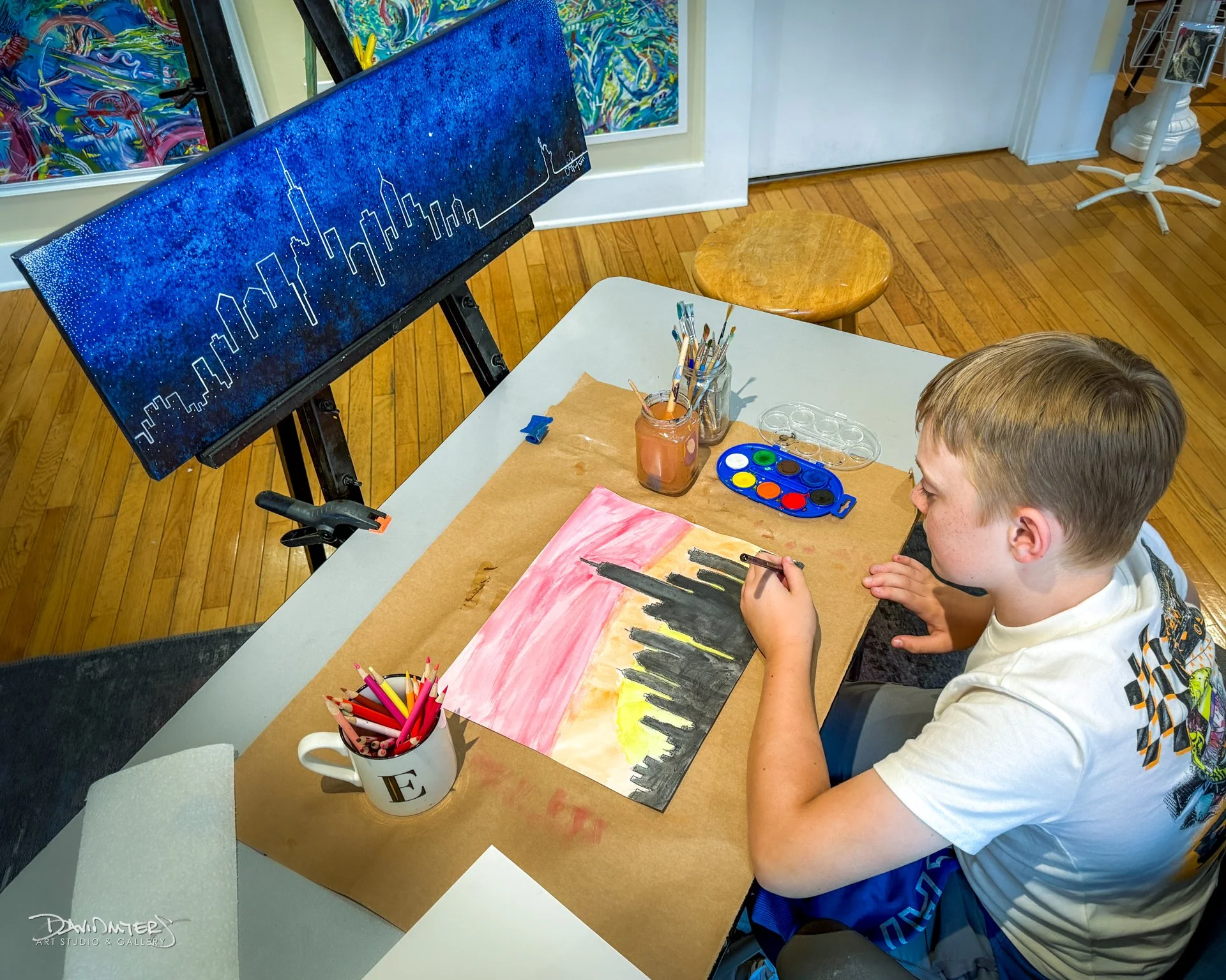 ✍️A Signature Moment

Nolan signs &ldquo;Warm Morning,&rdquo; inspired by the original multimedia piece of the NYC skyline, &ldquo;Home.&rdquo; Both works are now on view at the gallery&mdash;&ldquo;Home&rdquo; is available for purchase.  Stop in and
