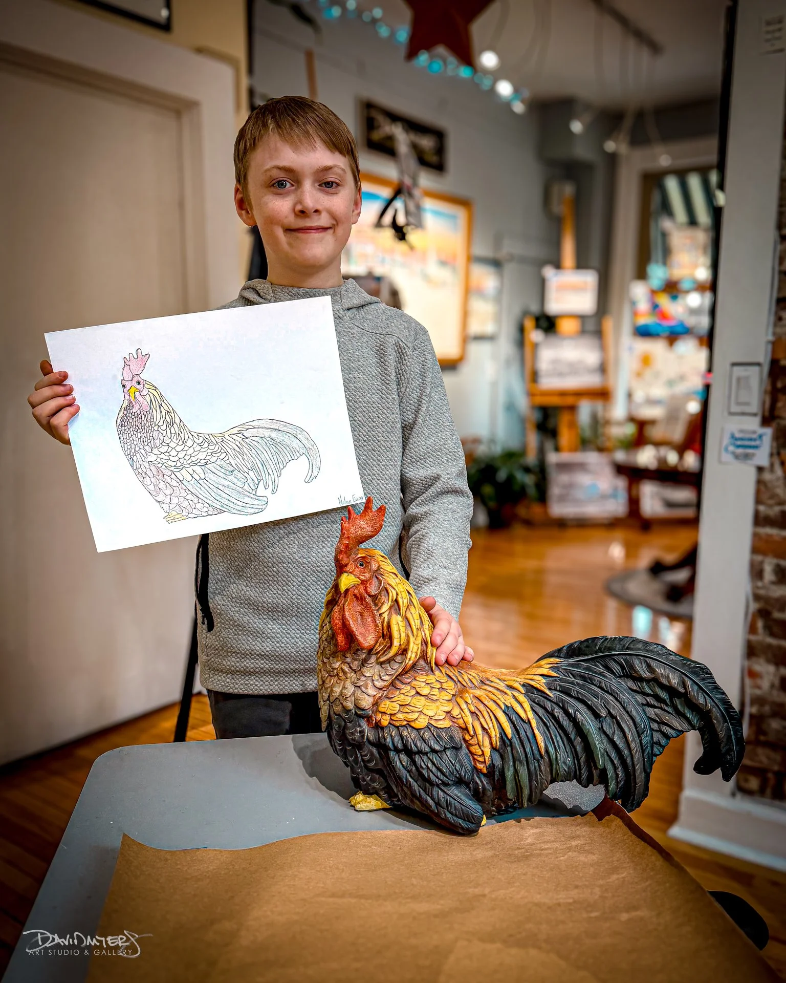 Titled "Easy Street" - and inspired by his role as &ldquo;Rooster&rdquo; in his middle school production of Annie, Nolan explores character through colored pencil. This technically refined piece marks a skilled departure from his signature 