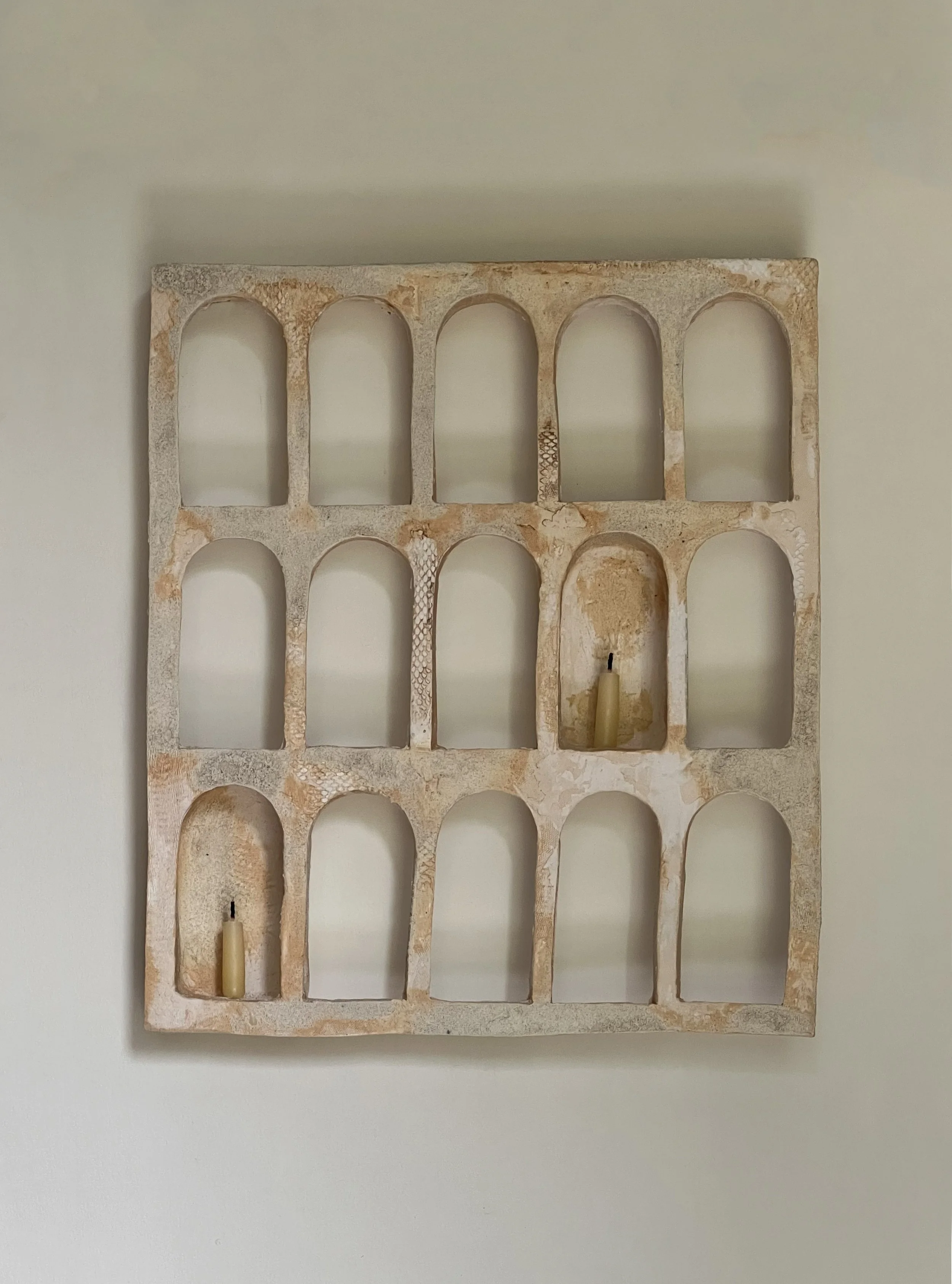 Aged ceramic candle shrine by British Asian artist, Seetha Hallett