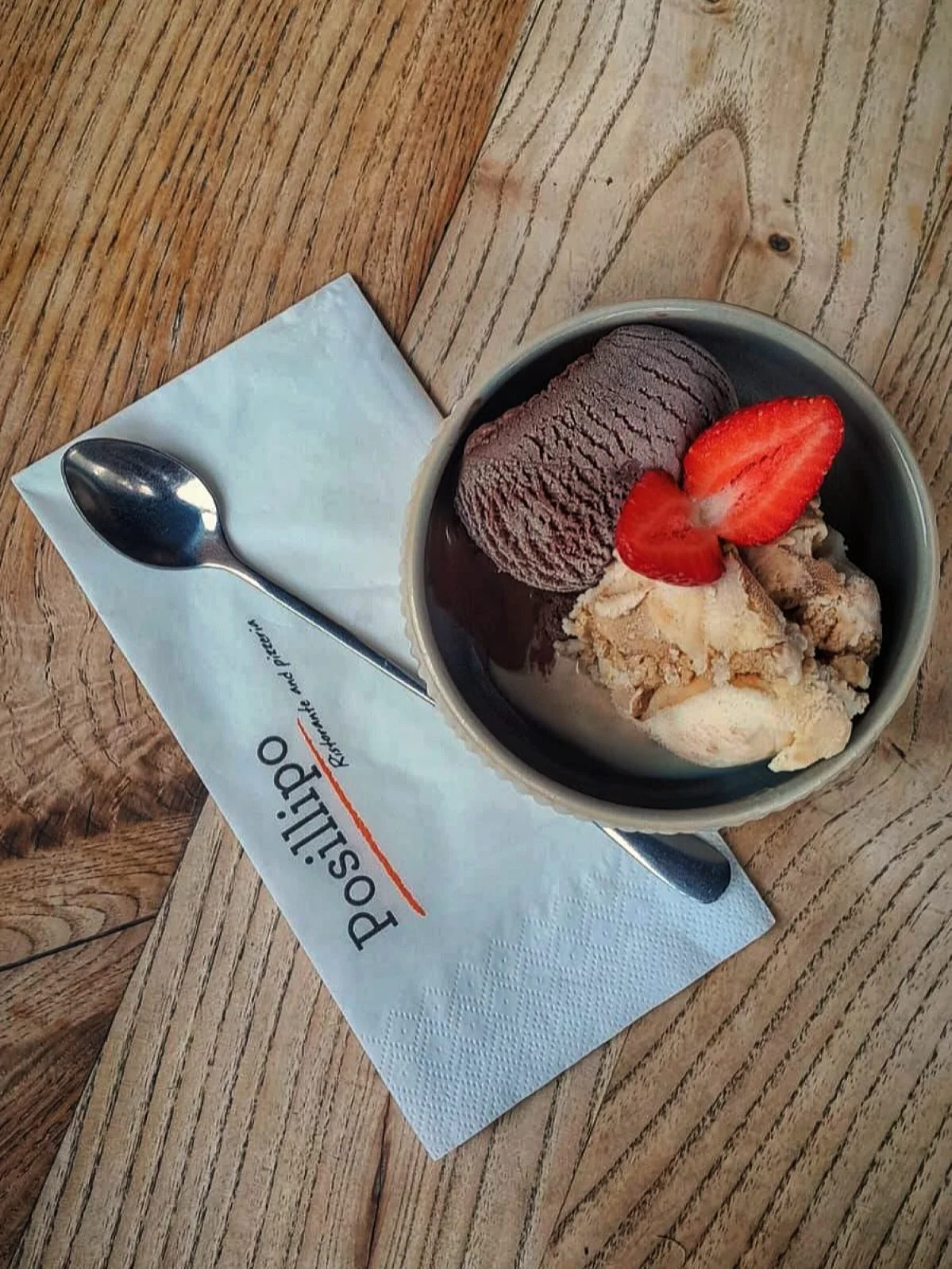 One scoop of rich, velvety chocolate and another scoop of creamy tiramis&ugrave; gelato topped with strawberry, the perfect sweet ending to your meal at Posillipo 🍨

Craving something else? We&rsquo;ve got an everchanging menu of desserts waiting fo