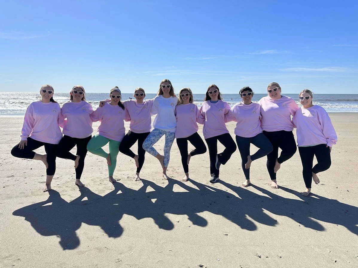 Charleston bachelorette party celebrating together after a private yoga session on Isle of Palms