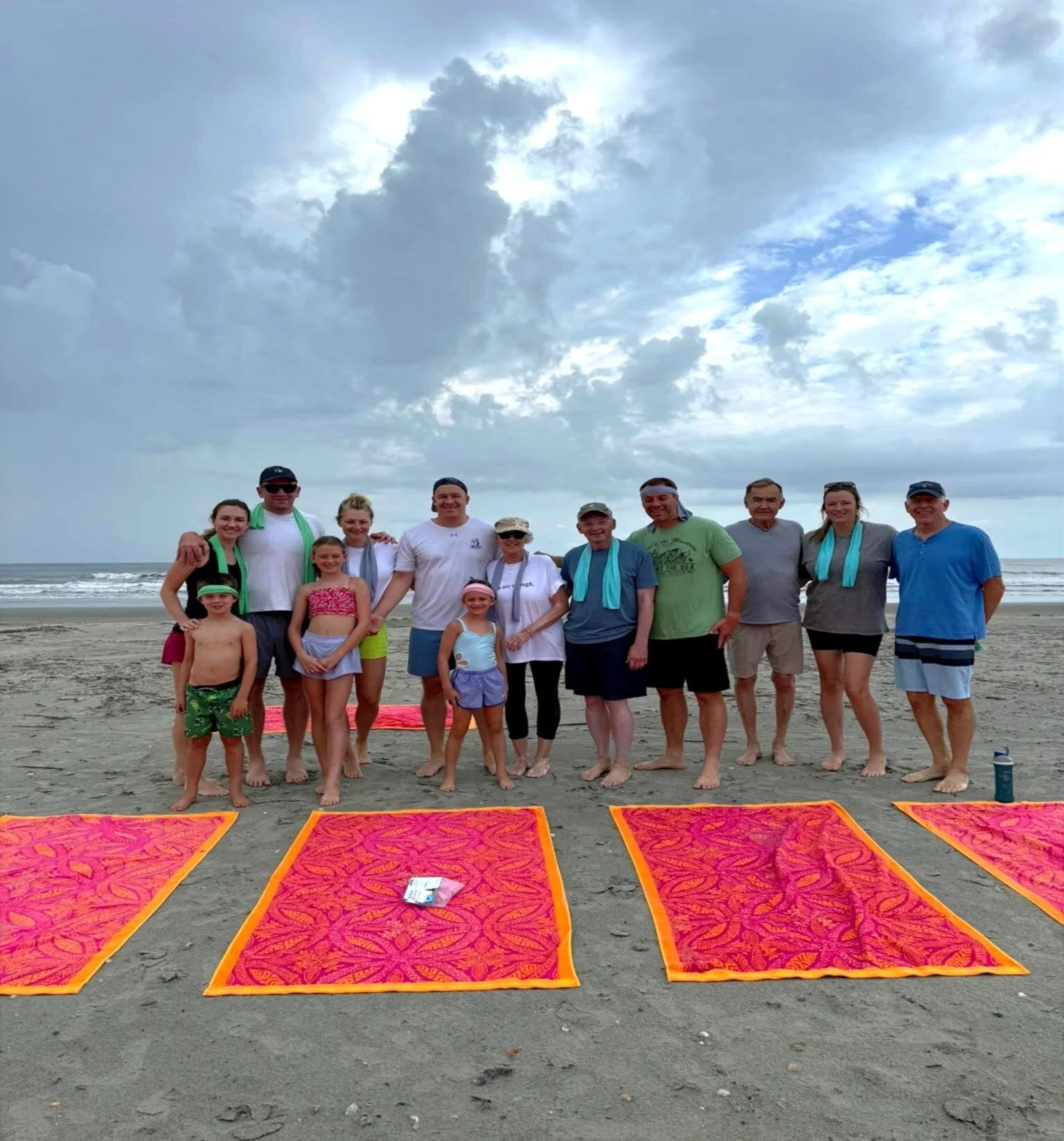 Private group yoga session on Folly Beach in Charleston, South Carolina. Serenity Tree Yoga offers beach yoga for families, birthdays, girls trips, wellness retreats, and vacation groups.