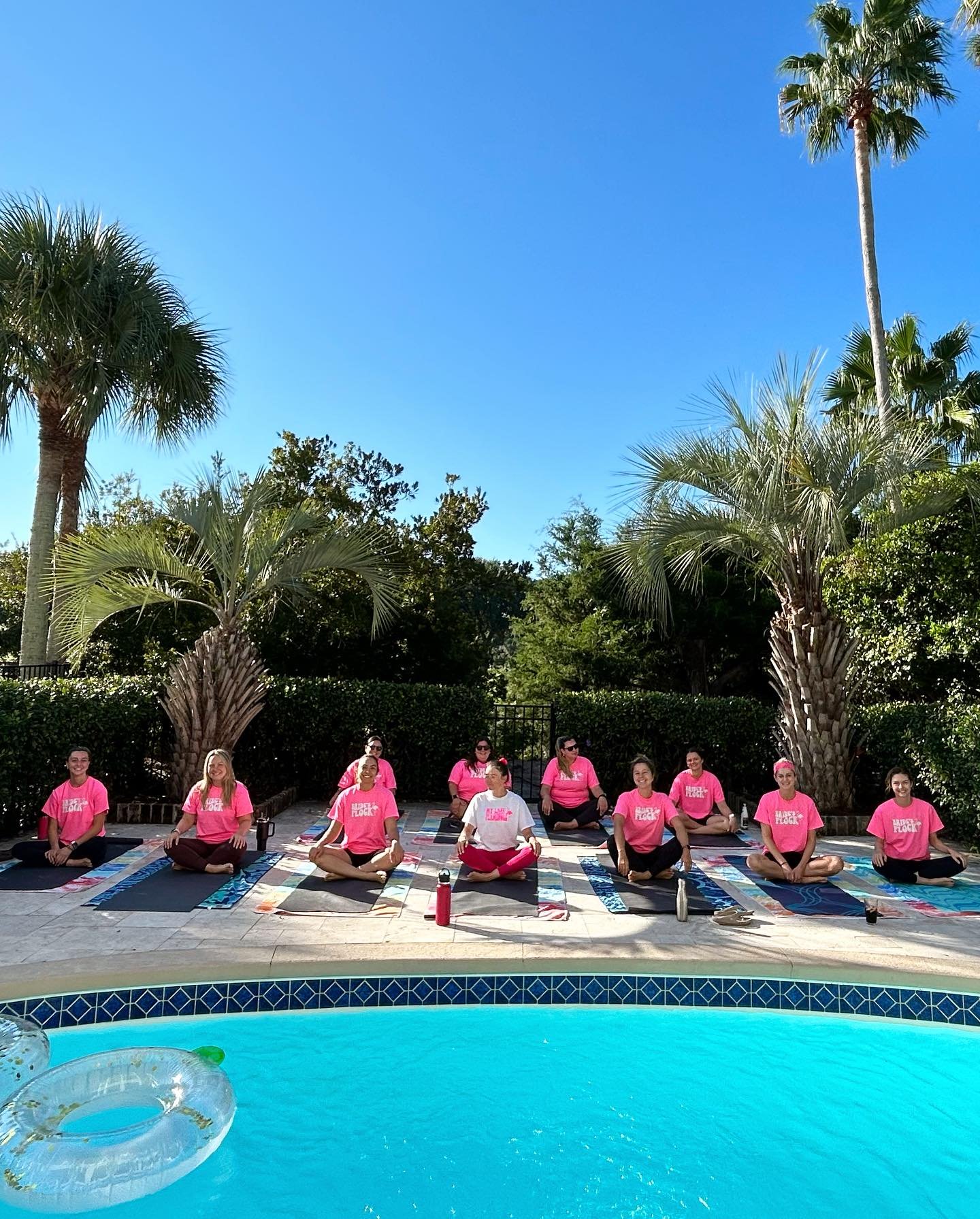 Poolside yoga for a Charleston bachelorette party at a private vacation rental with Serenity Tree Yoga.