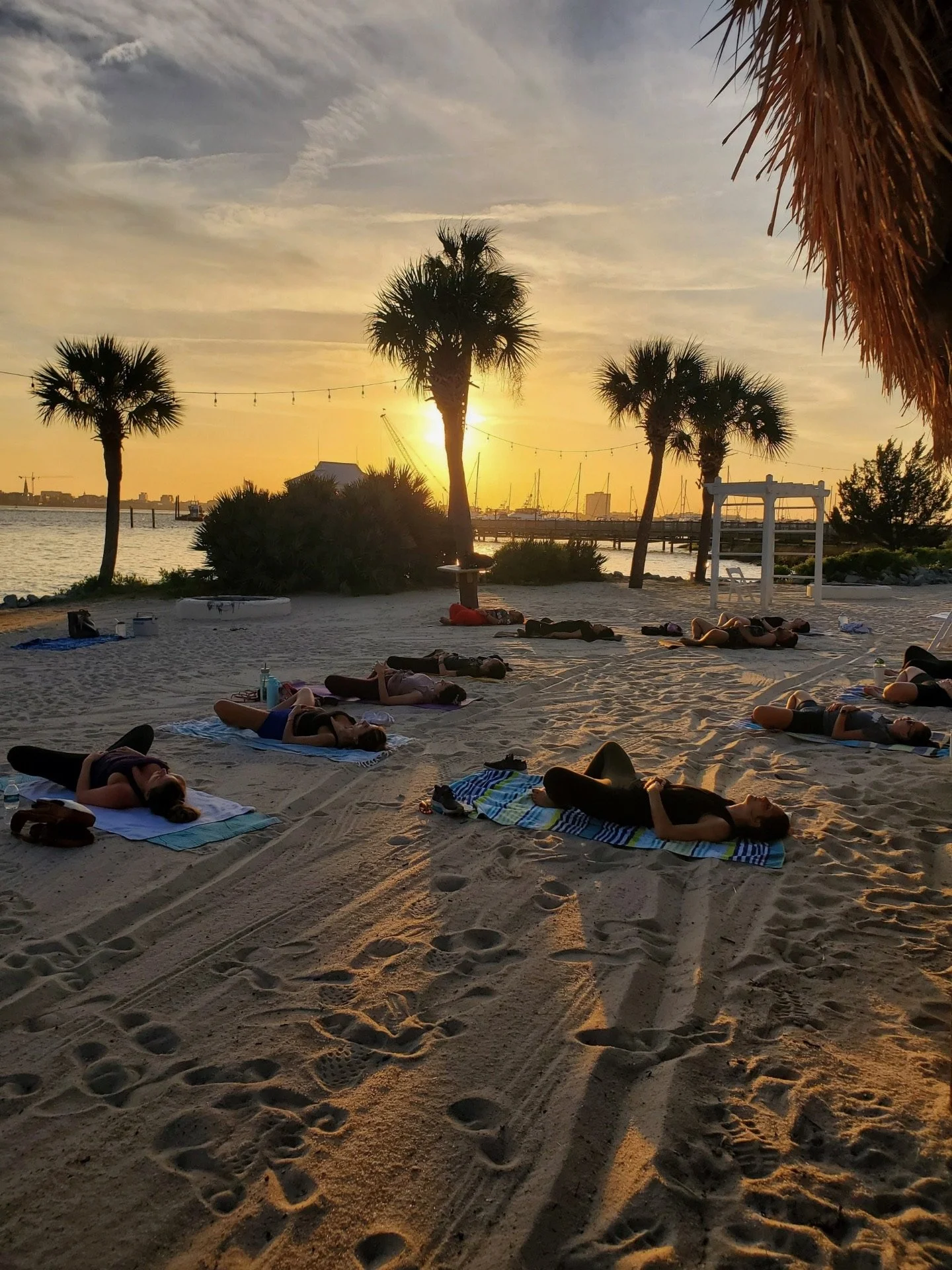 Community Beach Yoga class at The Charleston Harbor Resort and Marina in Charleston, South Carolina