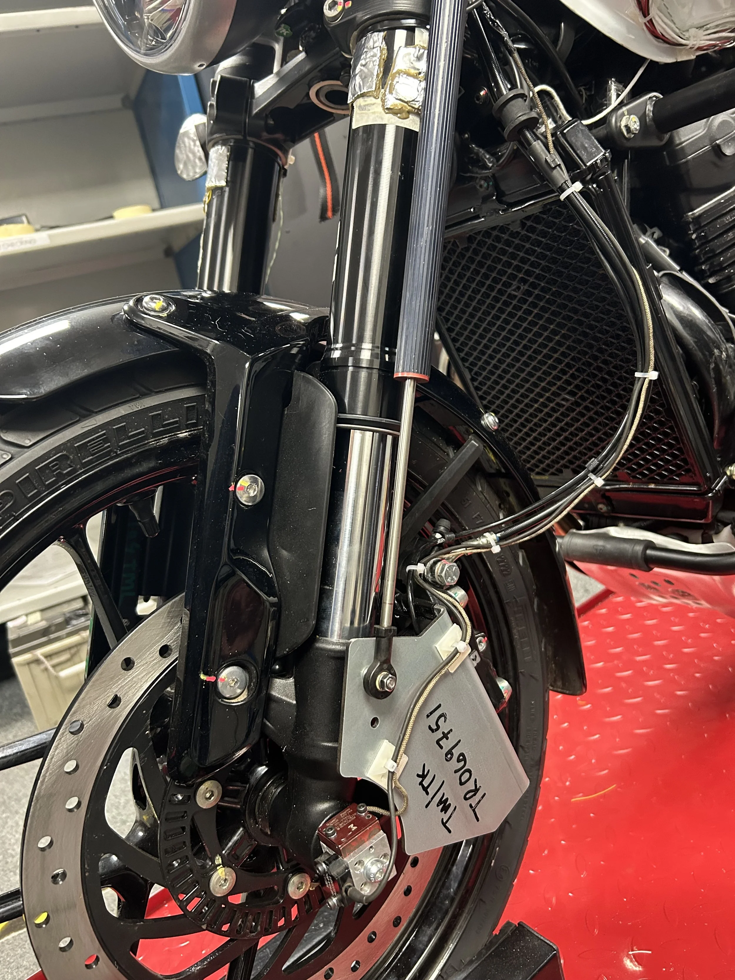 Triumph Instrumented front fork.JPG