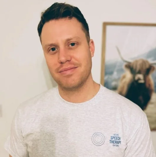 Portrait of George Webb, a qualified speech therapist specialising in adult speech and language therapy. Online adult speech and language therapy. Speech Therapy. SLT