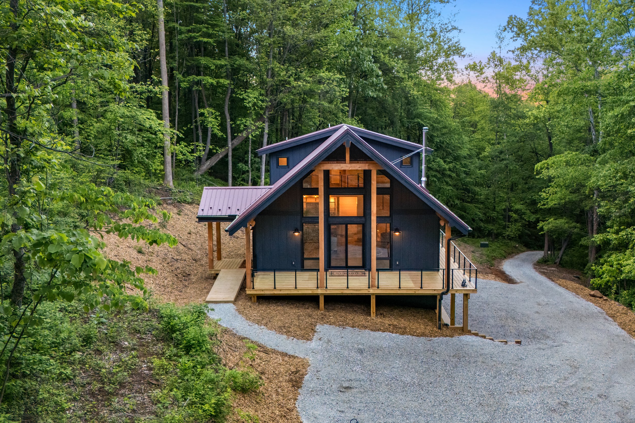 Contemporary mountain home combining natural materials, handcrafted woodwork, and modern design for comfortable year-round living in Central Virginia.