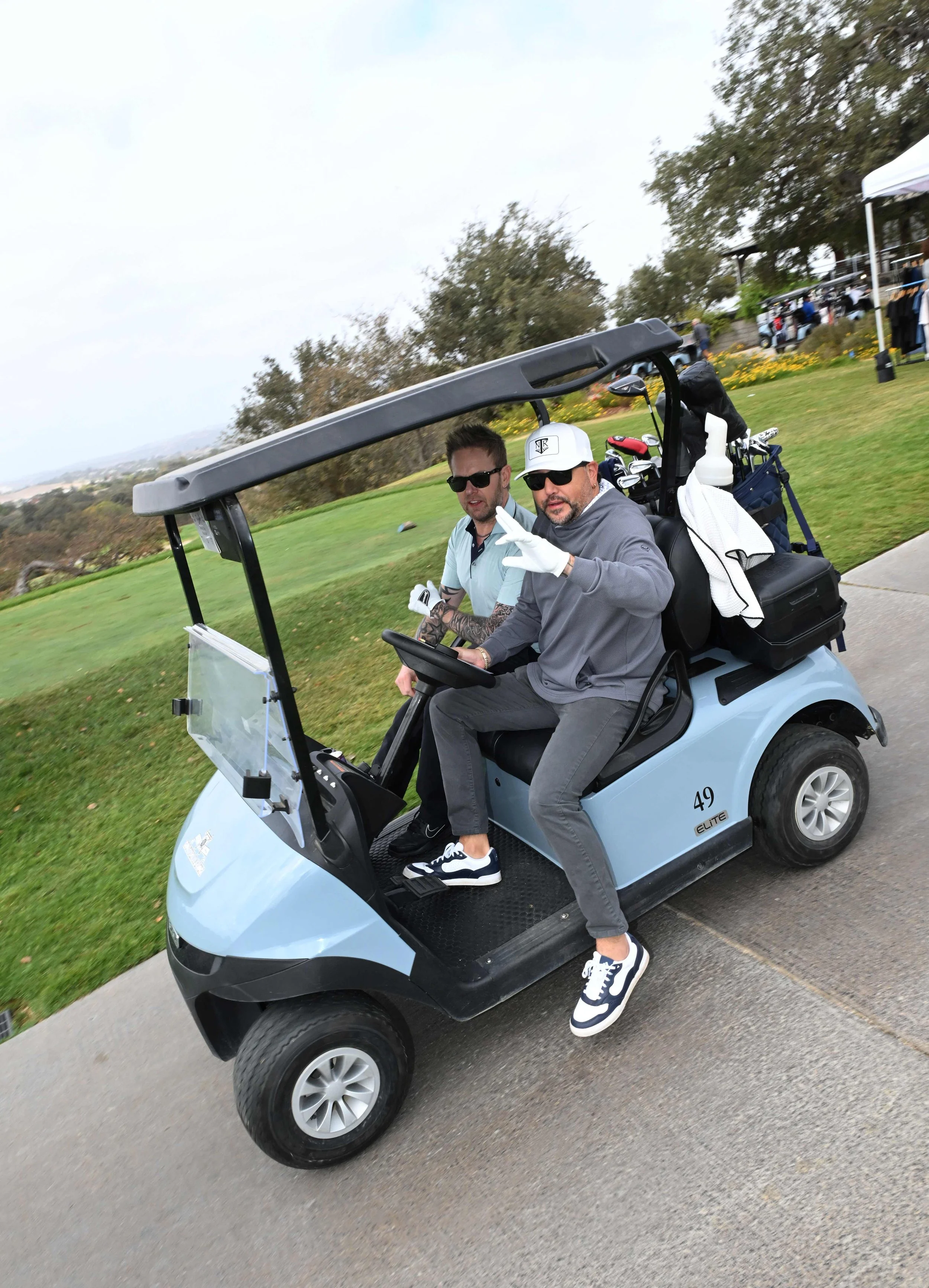jason aldean and tully kennedy golfing sm.jpg
