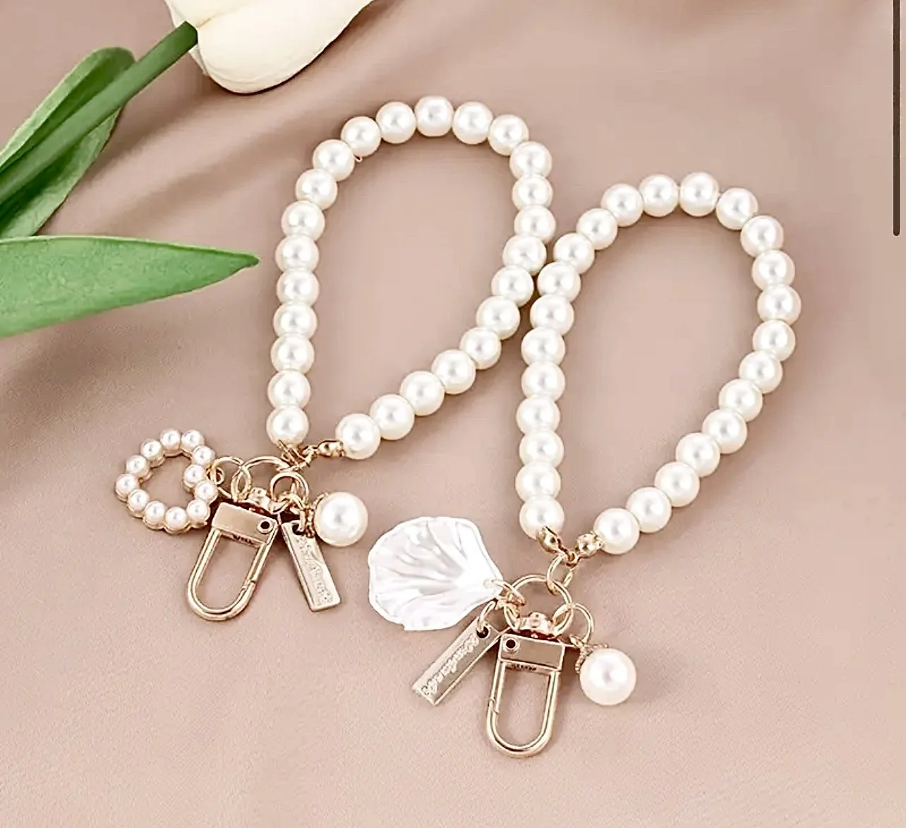 Faux pearl heart bracelet keychain featuring gold clasp, stylish gift accessory