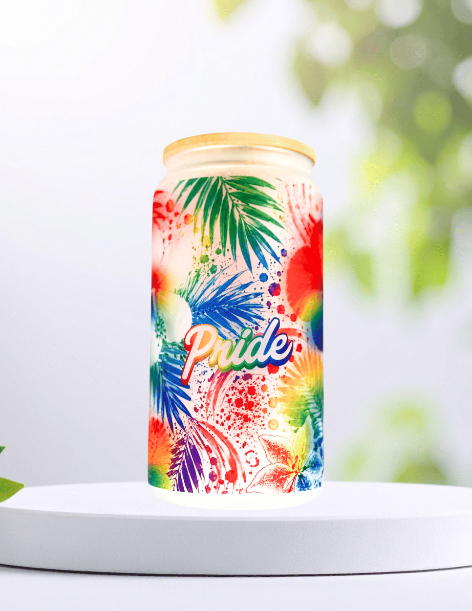 Tropical Pride 16 oz glass tumbler featuring vibrant rainbow hibiscus flowers, bamboo lid, and reusable straw—perfect for iced coffee, tea, and Pride gifts.